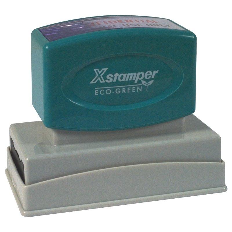 Xstamper Eco-Green self-inking stamp on base for imprinting documents with eco-friendly ink, date or custom messages for office paperwork.