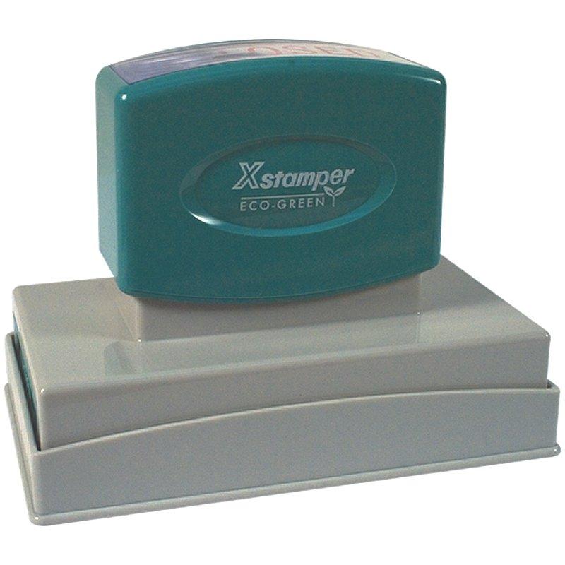 Xstamper Eco-Green teal self-inking stamp on metal base for quick, clean date and message imprinting.