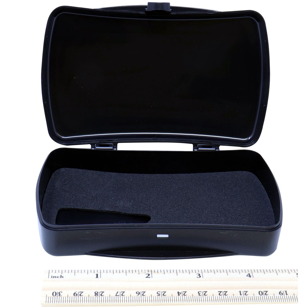 Open black hard plastic storage case with foam insert, product display on white background with ruler for size reference.