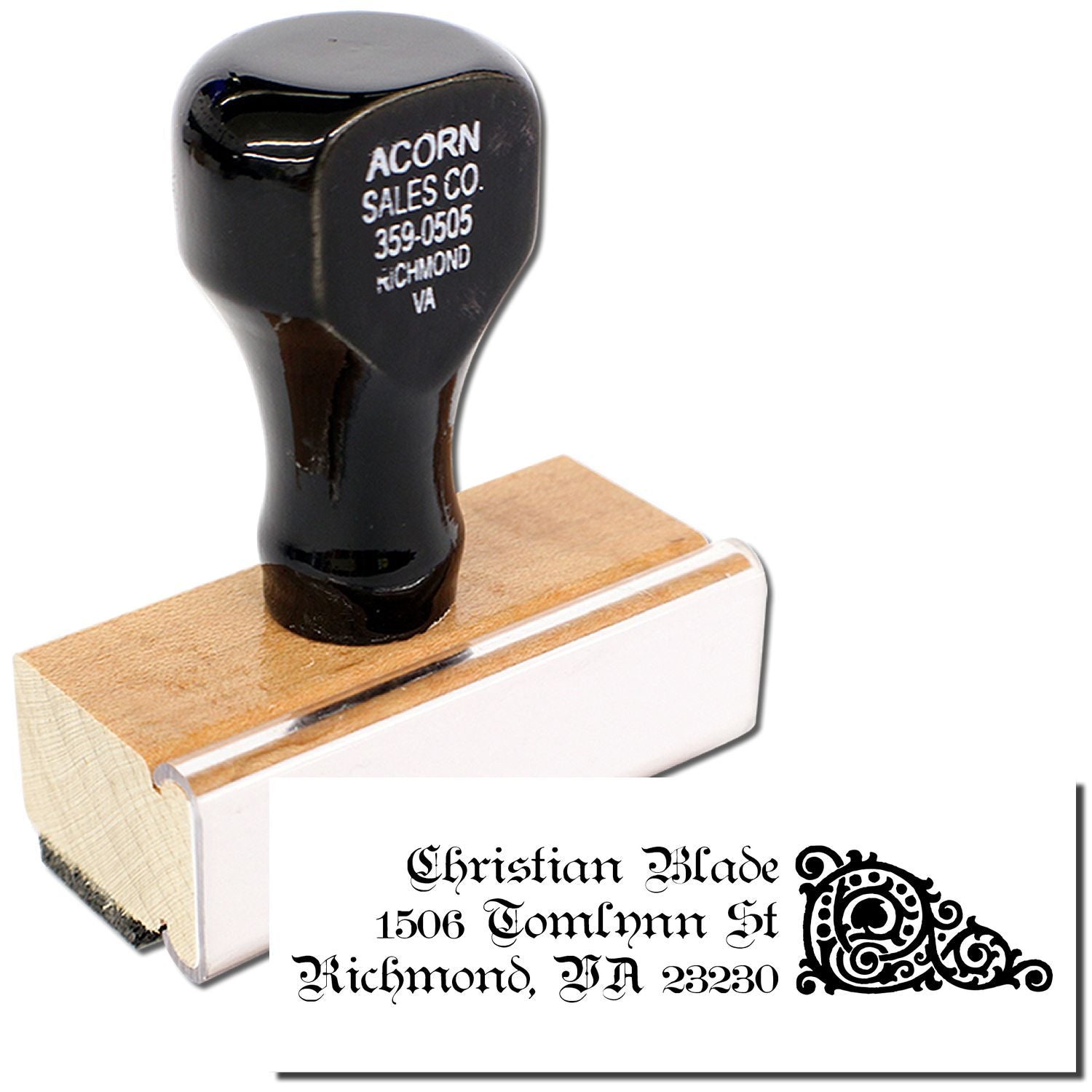 Custom address rubber stamp with wooden handle and gothic monogram for personalized mailing and branding.