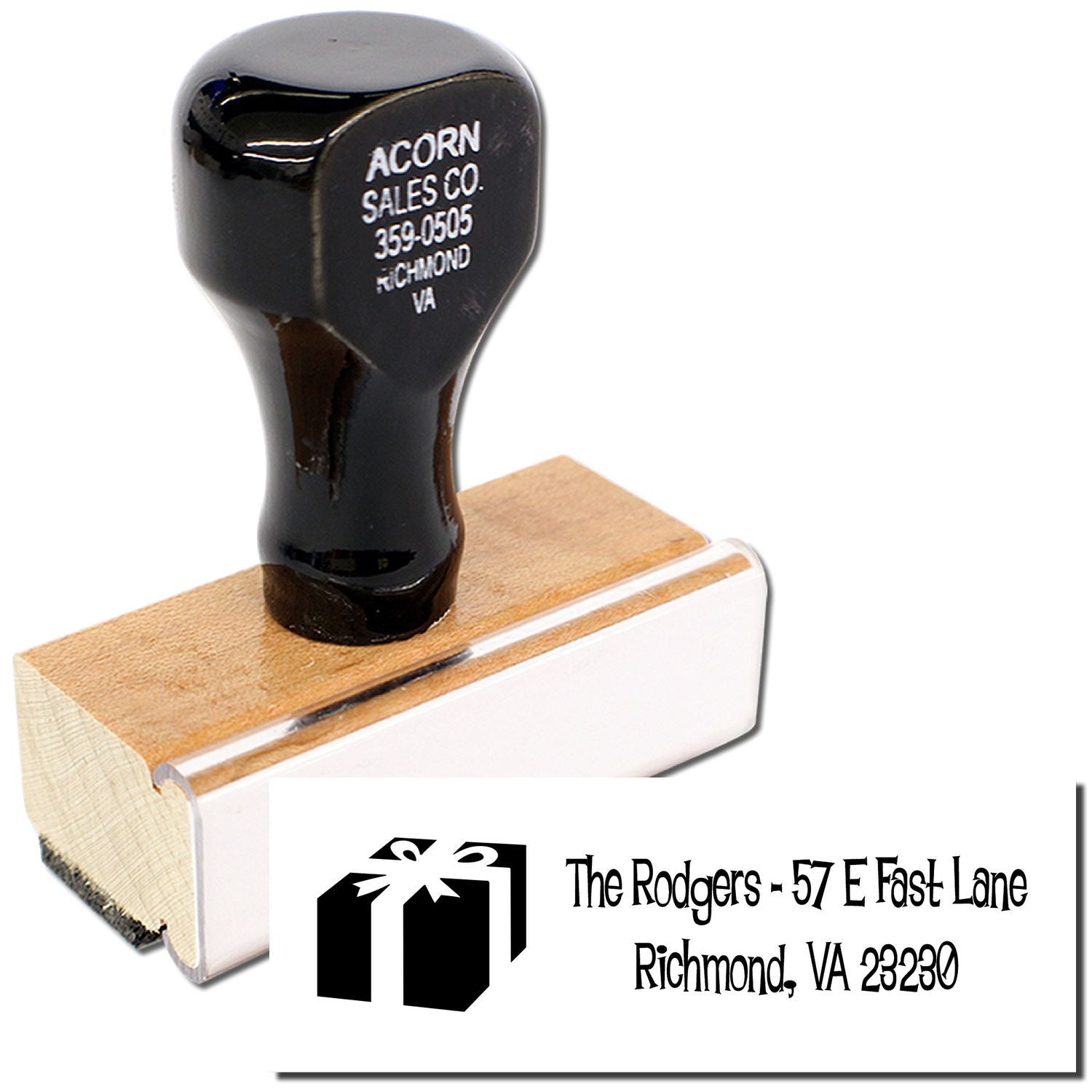 Custom return address rubber stamp with gift icon, personalized name, and Richmond, VA address for mailing and packaging.