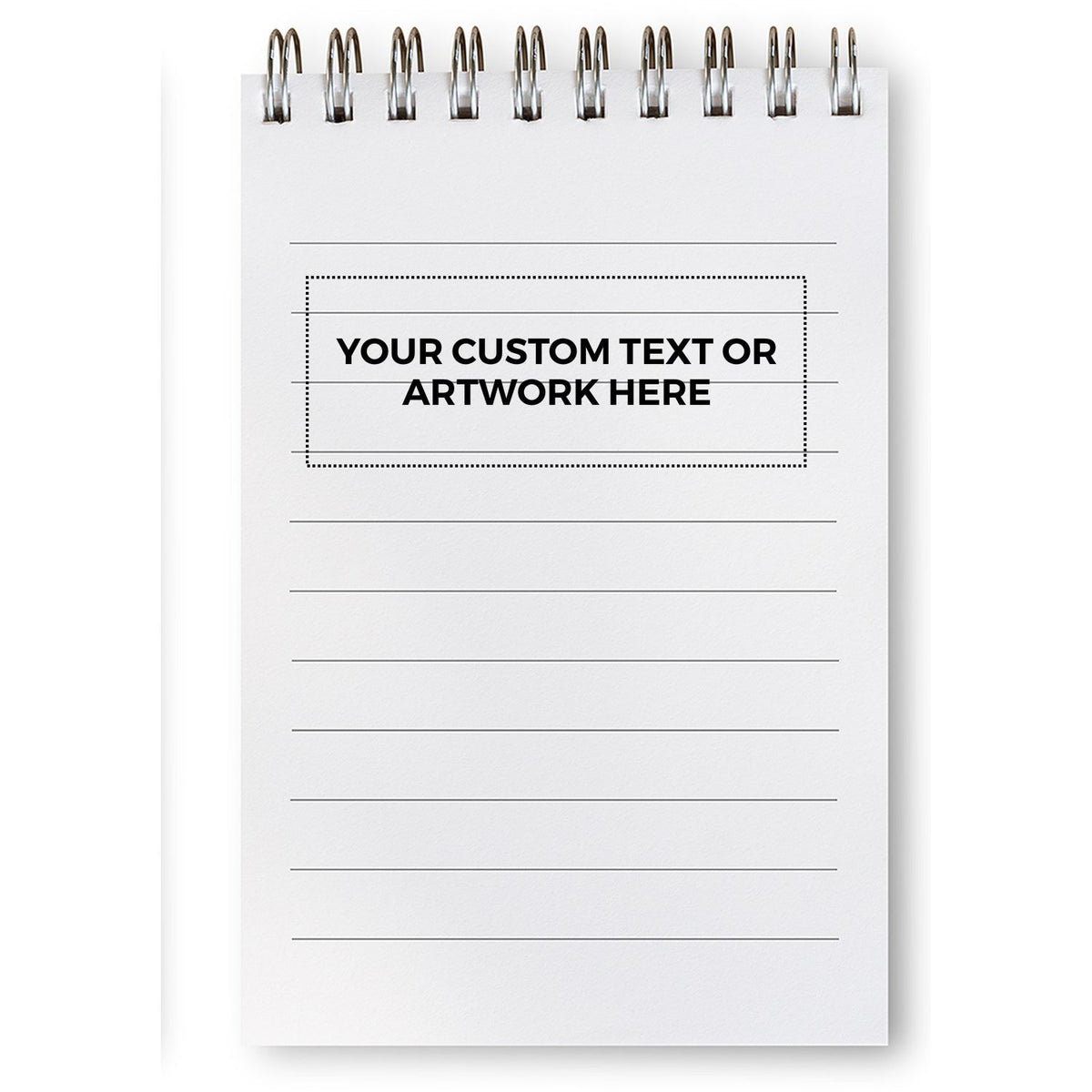 Custom text or artwork placeholder on a blank lined notebook page, secured with binder clips for printing and design mockups
