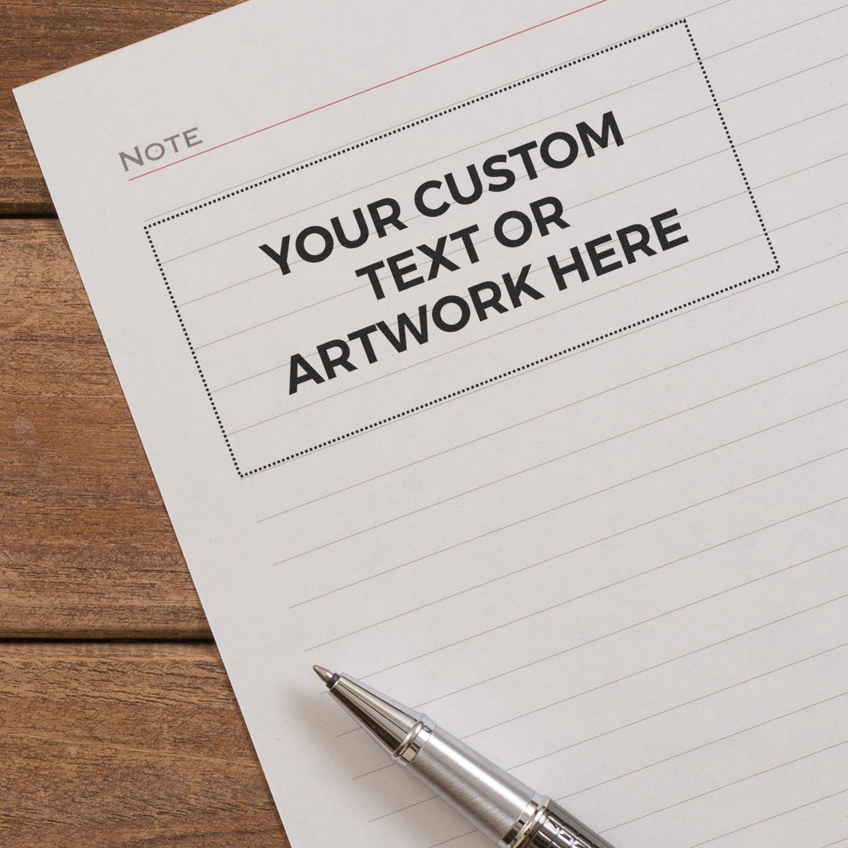 Template note for custom text or artwork: Your custom text or artwork here with pen on desk