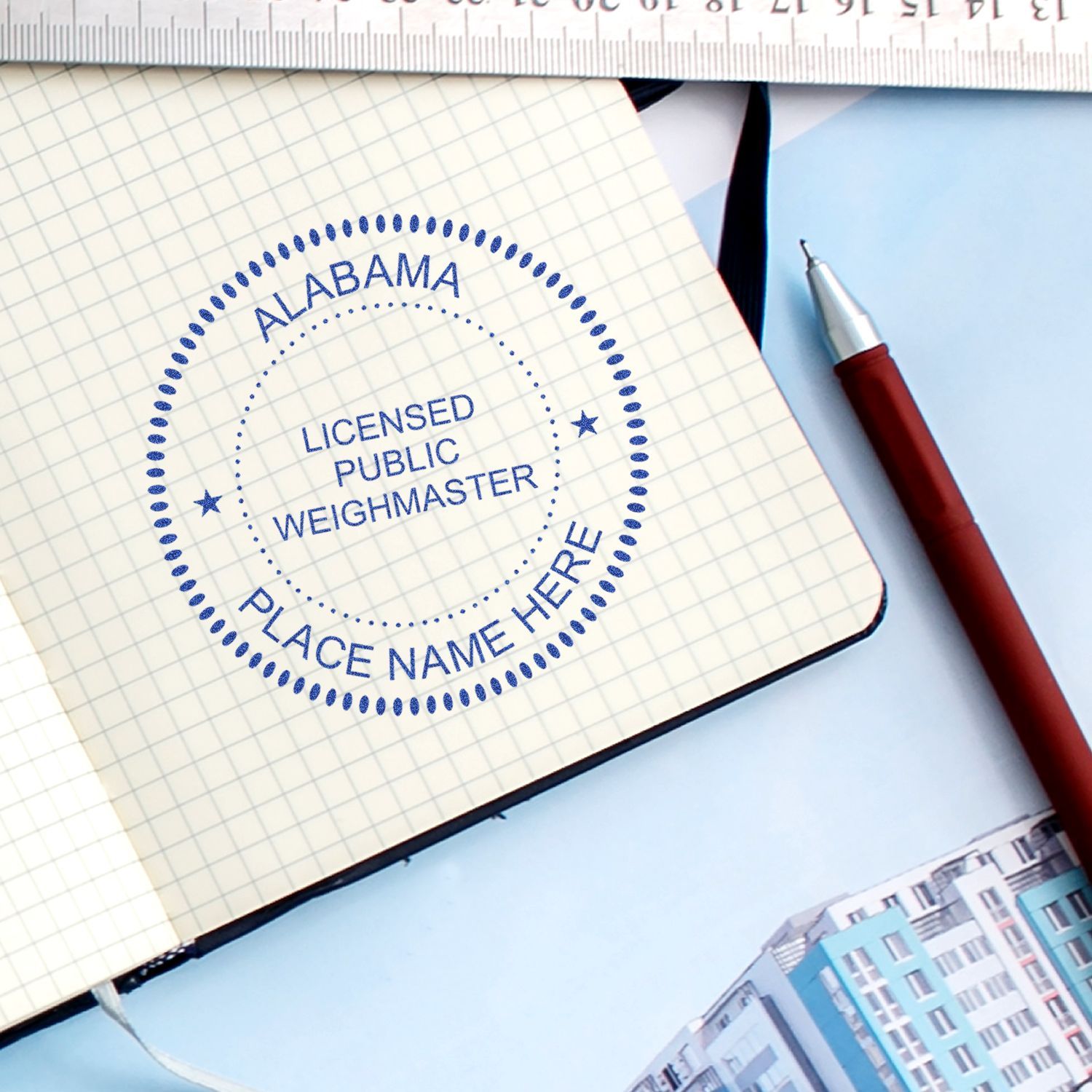 Alabama licensed public weighmaster stamp on graph paper notebook with pen and ruler for business documentation