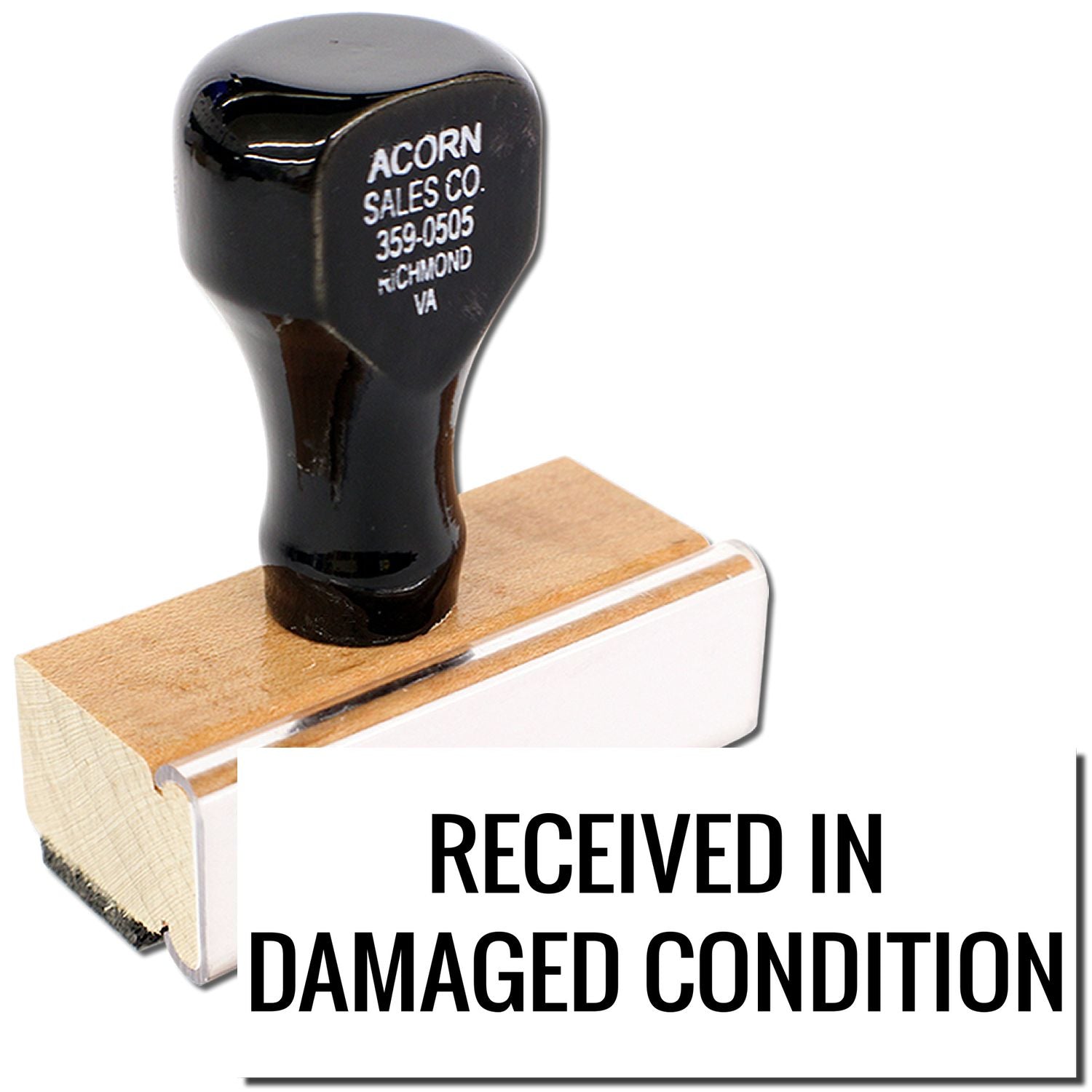 Close-up of a rubber stamp reading Received in Damaged Condition for package inspection and damage claims.