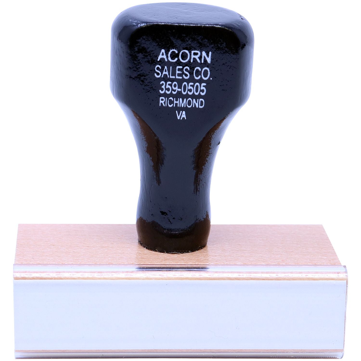Black rubber stamp with Acorn Sales Co. Richmond VA text on wooden base, office supply tool on white background