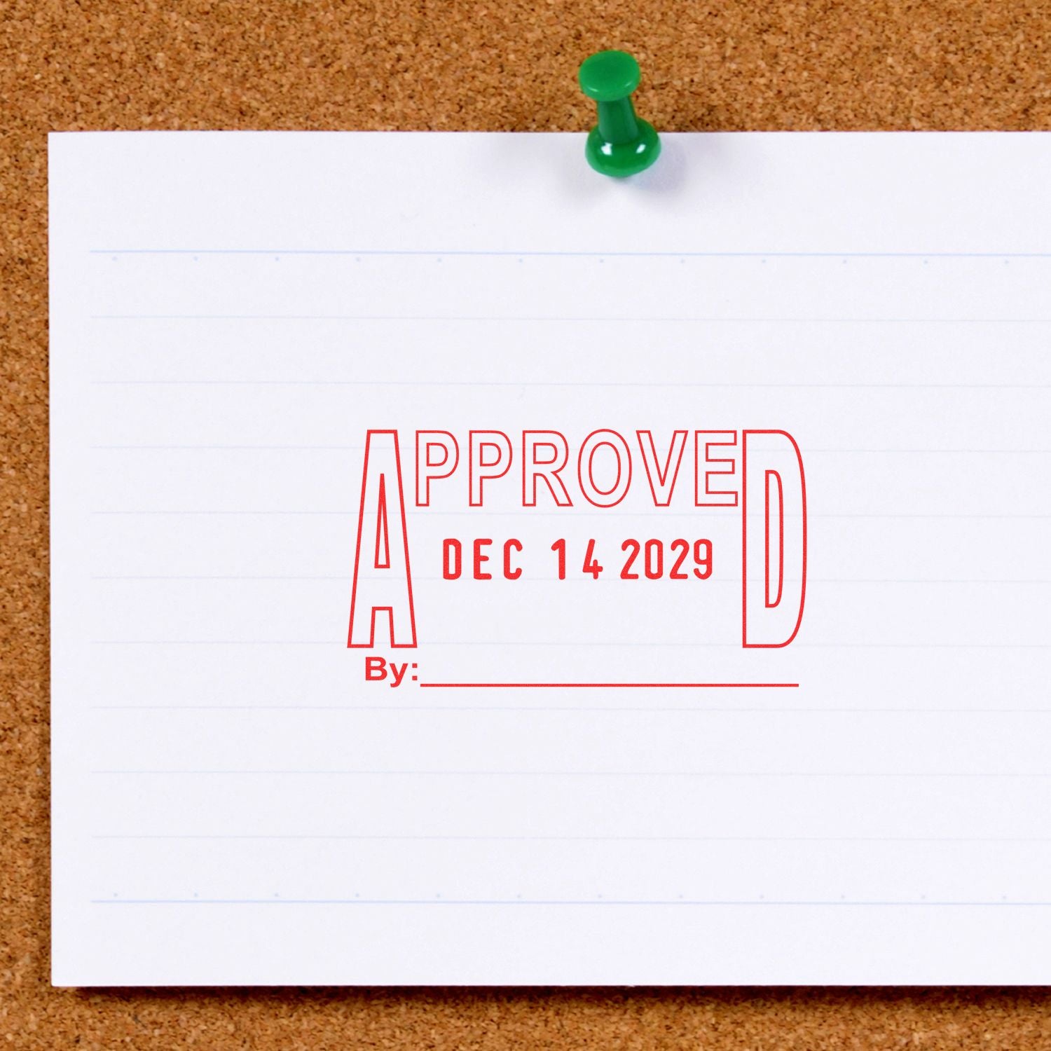 Approved stamp on pinned document paper with dated signature line on corkboard background