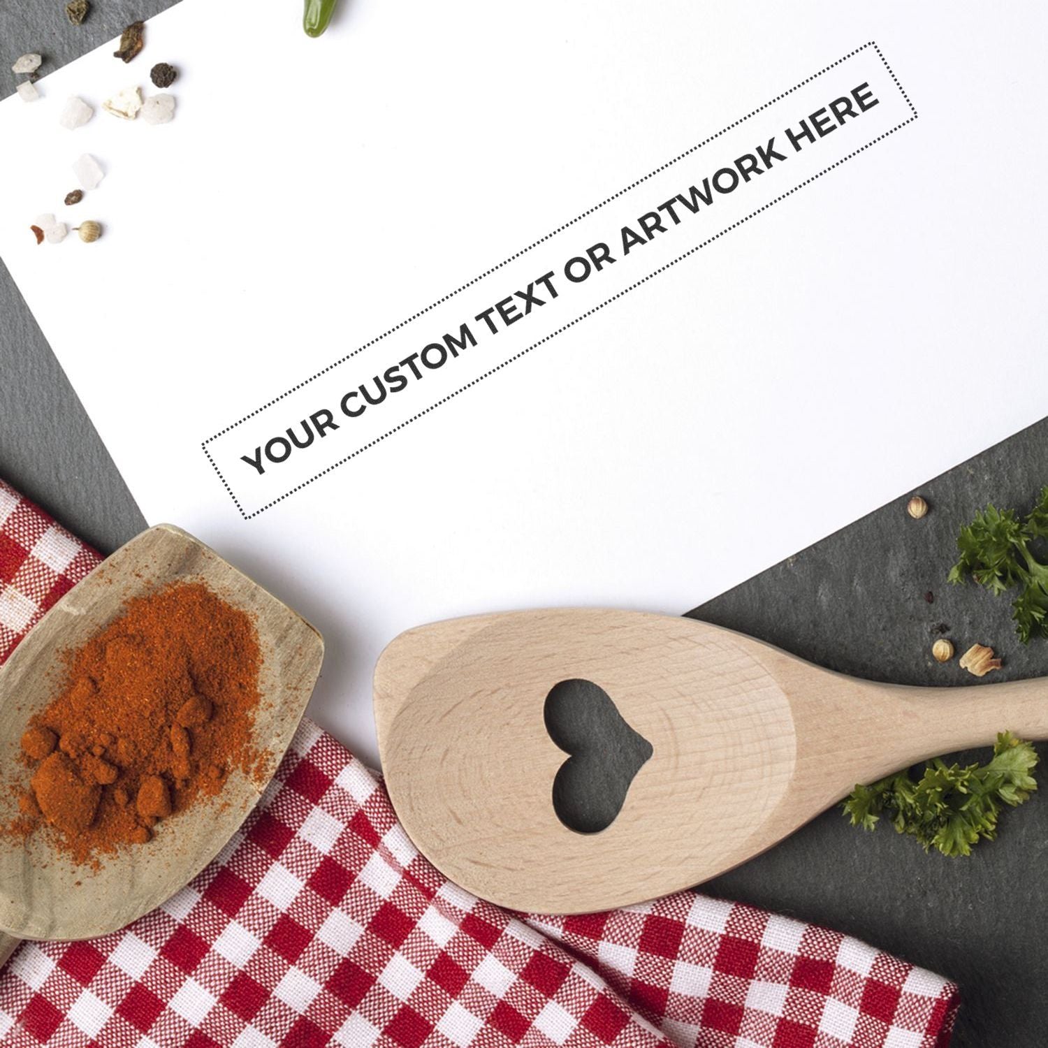 Kitchen cooking ingredients with wooden spoon and custom text area for spice blend promotion.