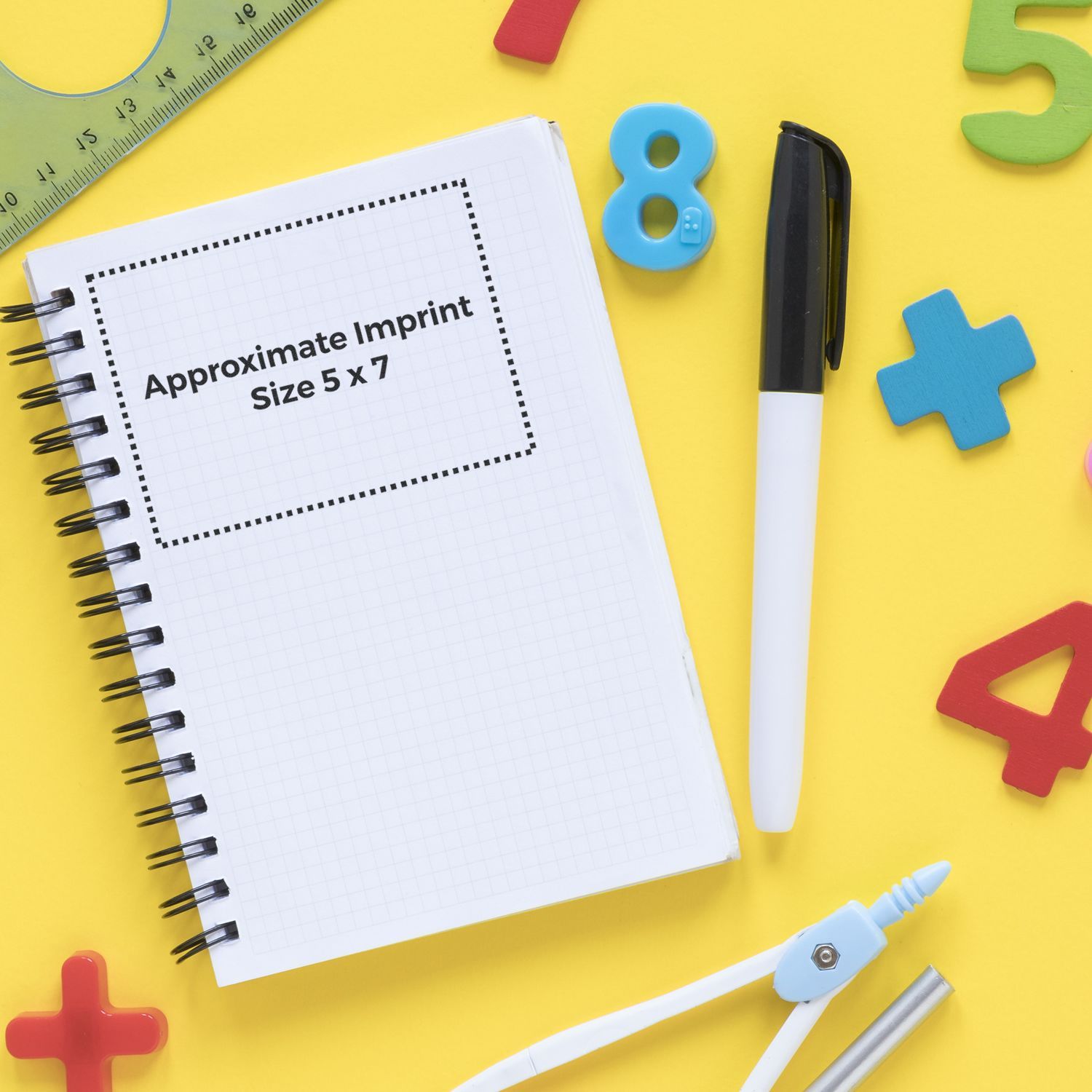 Approximate imprint size 5x7 shown on notebook with crafting tools, helping customers plan custom product printing and branding.