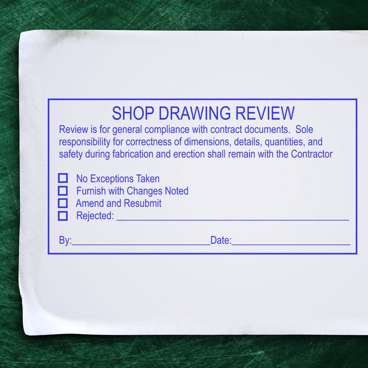 Shop drawing review form on white paper with blue text and checkboxes, used for construction and engineering approval.