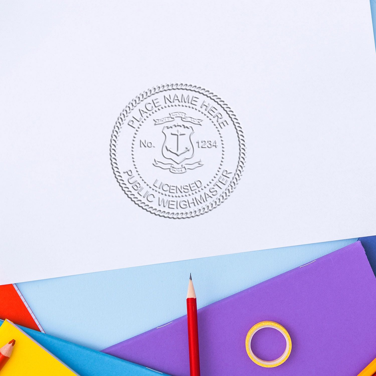 Blank embossed licensed public weighmaster seal on white paper with colorful stationery and pencil on a desk background.