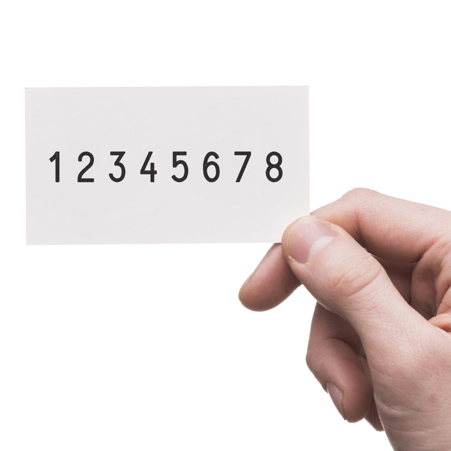 Close-up of a hand holding a numbered card with digits 1 through 8 on a white background.