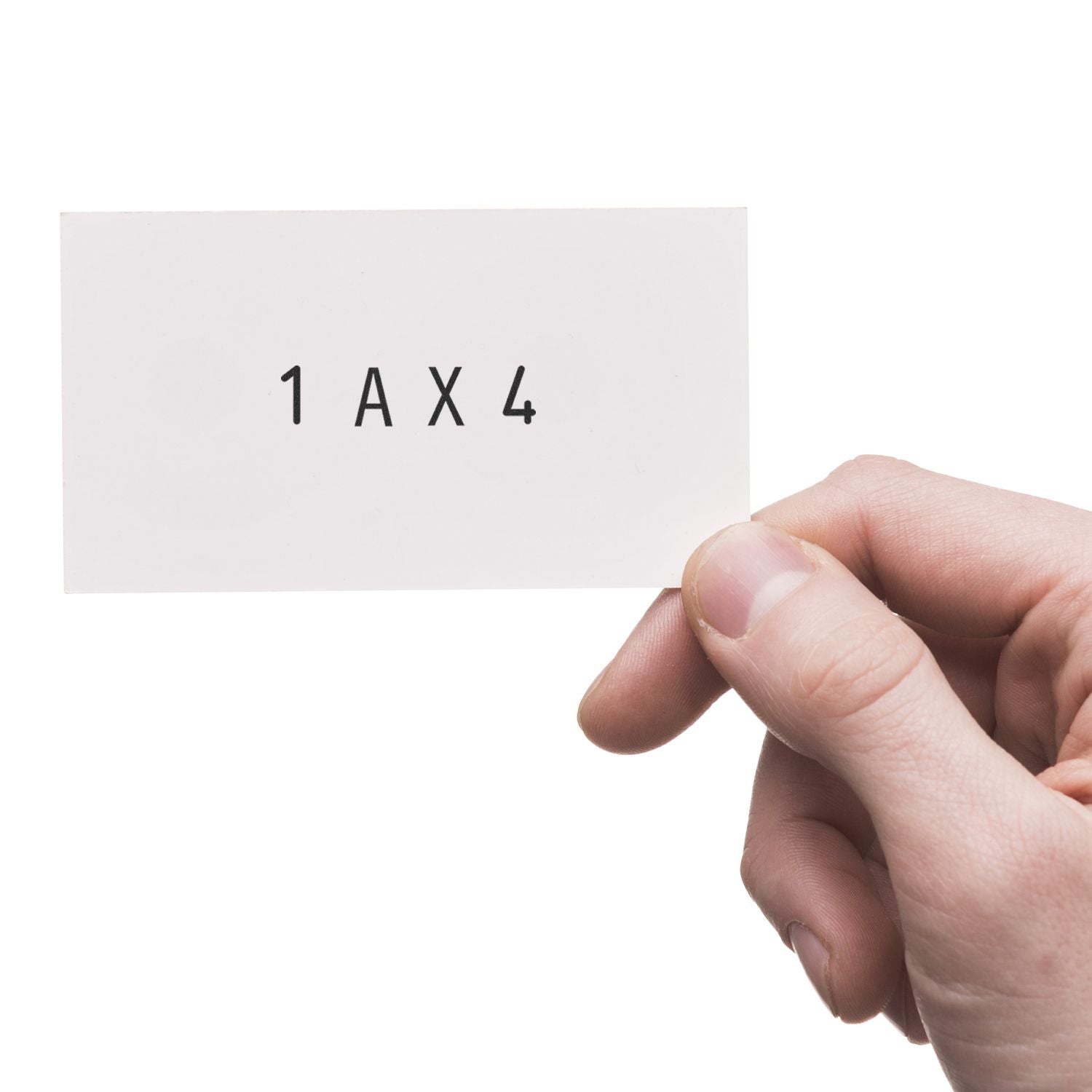 Hand holding white card with 1AX4 printed product code.