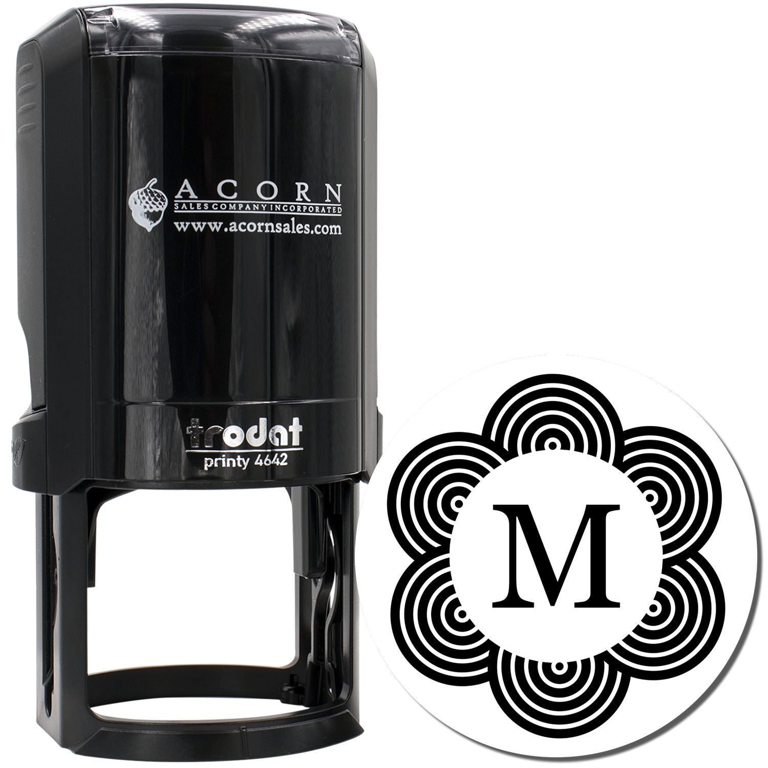 Custom self-inking rubber stamp with monogram letter M and decorative floral design, ideal for personalized branding and labeling.