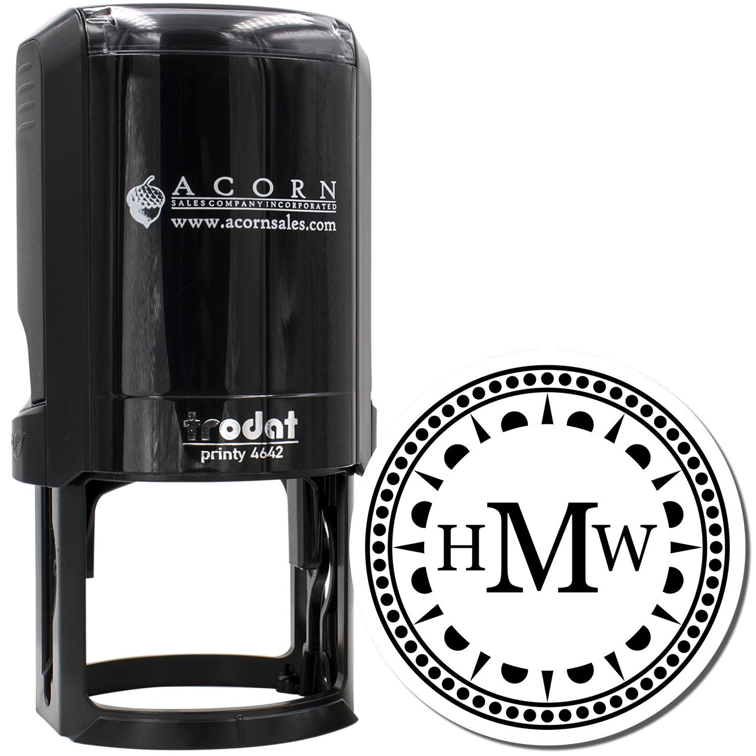 Black Trodat self-inking rubber stamp with custom round monogram logo for business branding.