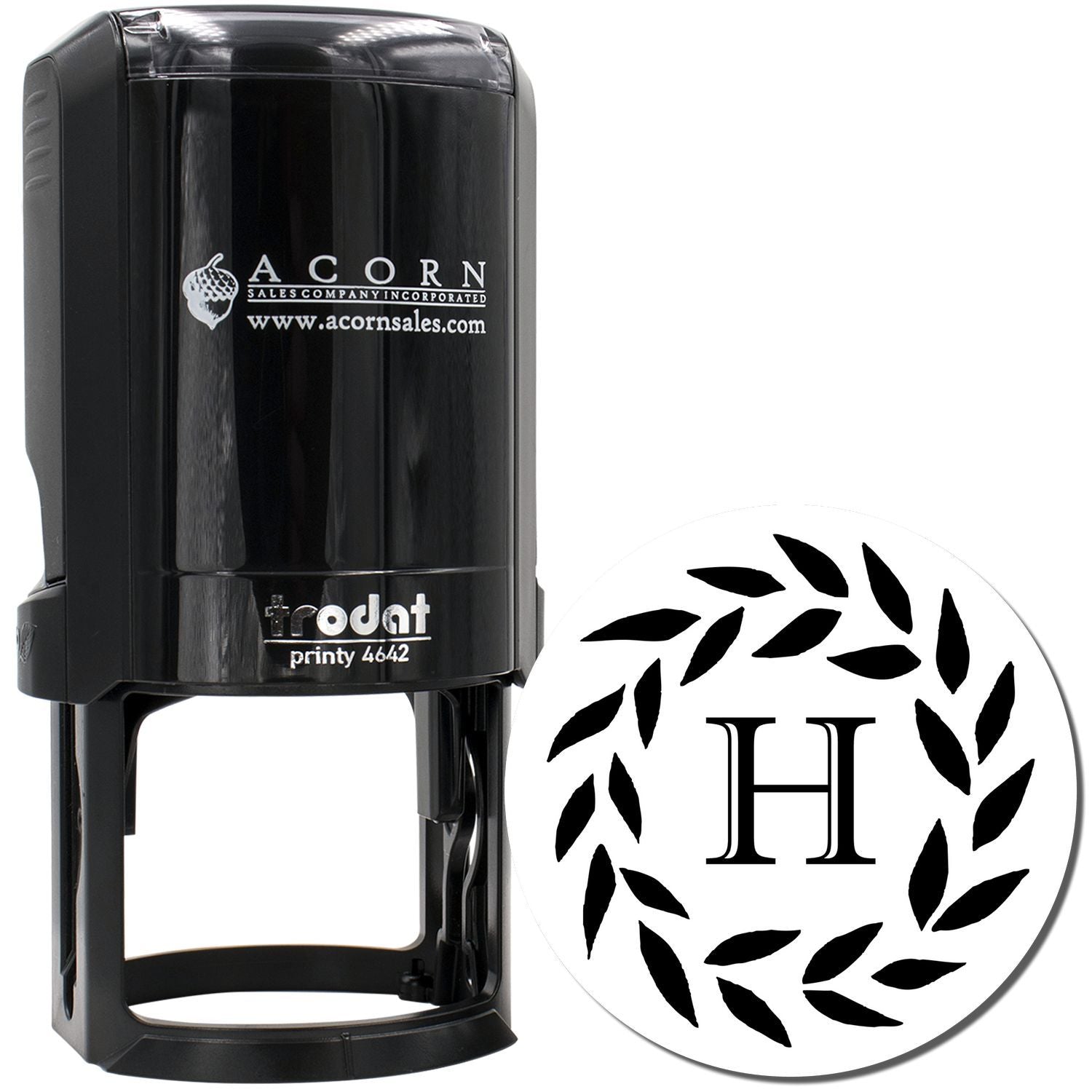 Custom self-inking rubber stamp with monogram H and leaf wreath design, shown with Trodat Printy 4642 stamp body.