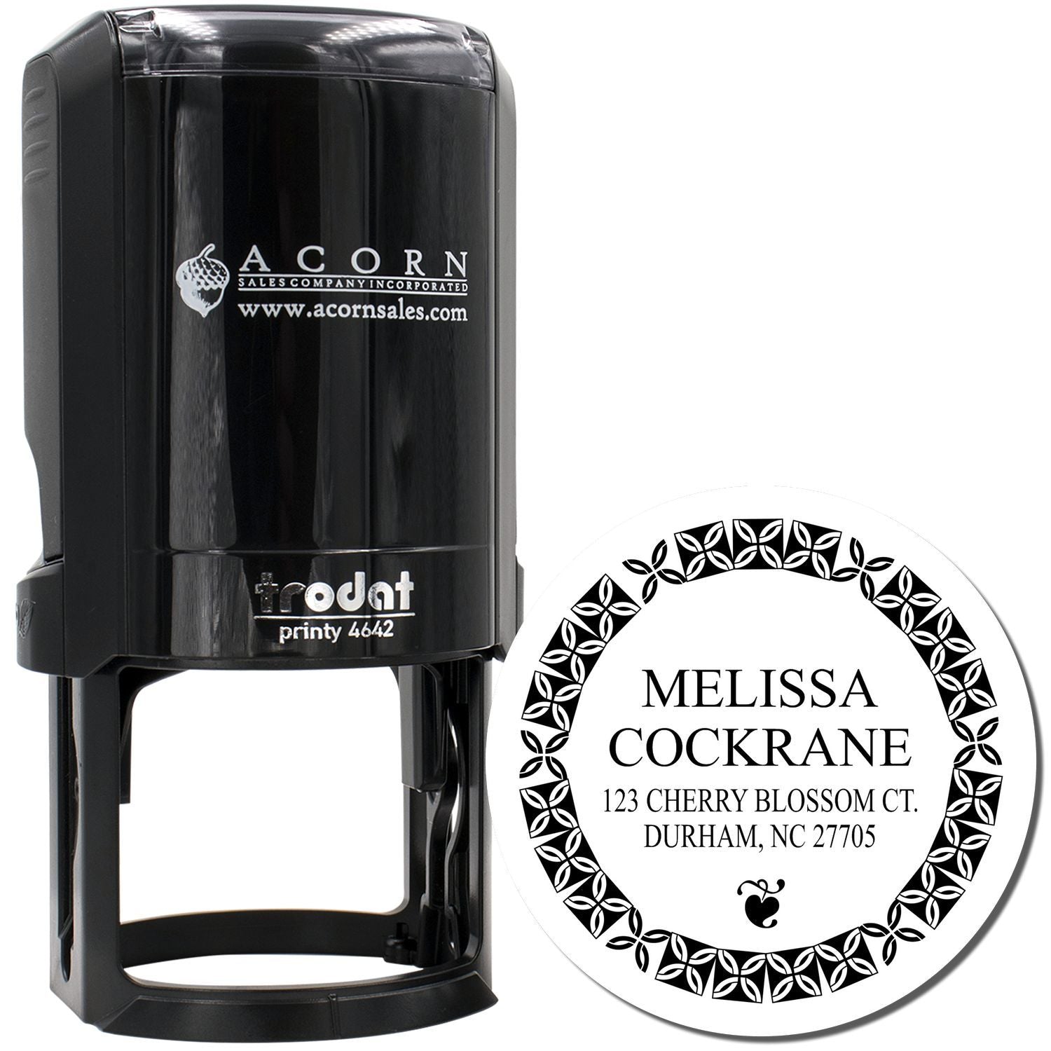 Custom self-inking rubber address stamp with Trodat Printy 4642 and floral round monogram for Melissa Cockrane.