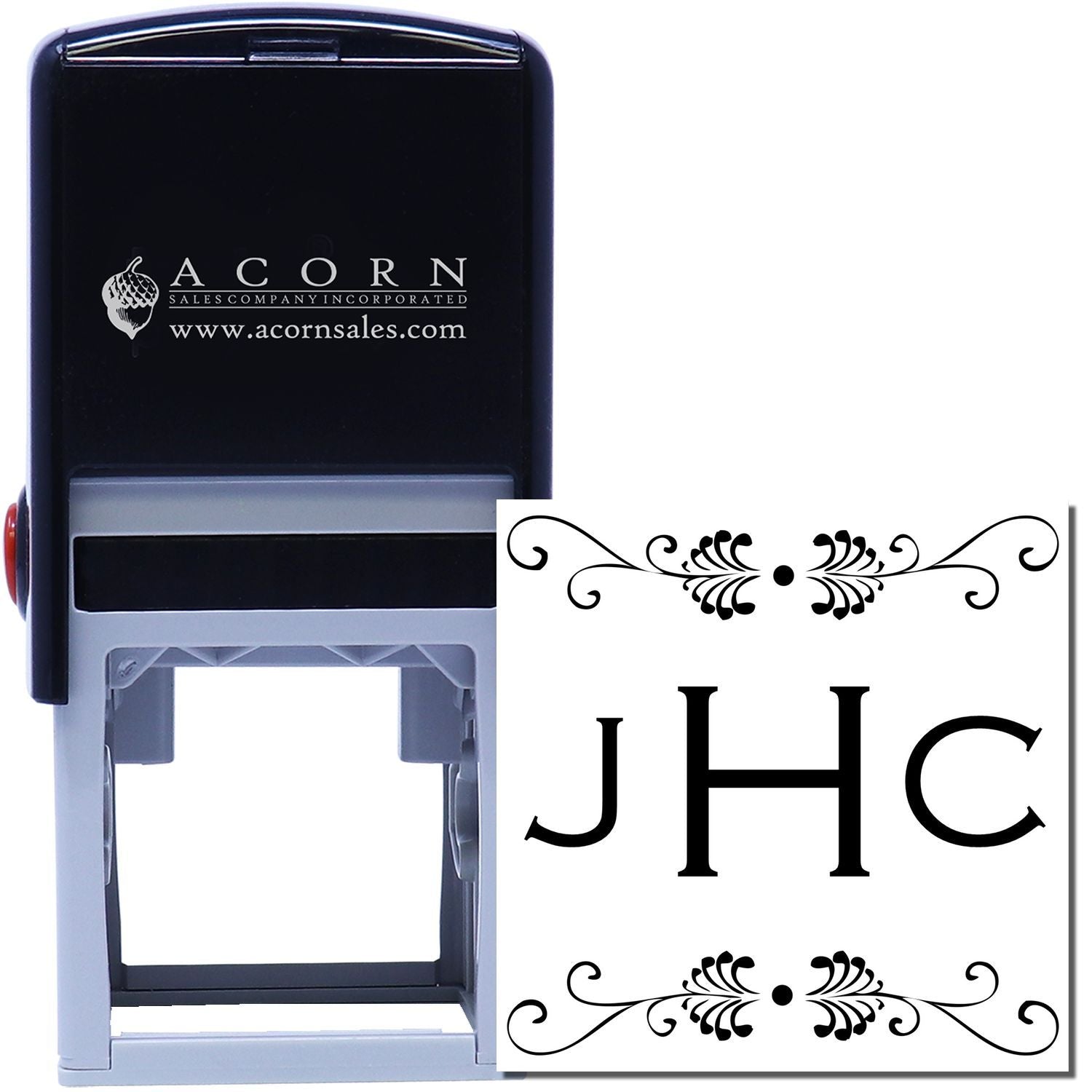 Custom self-inking rubber stamp with ornate JHC monogram and decorative flourishes for personalized stationery and crafts.