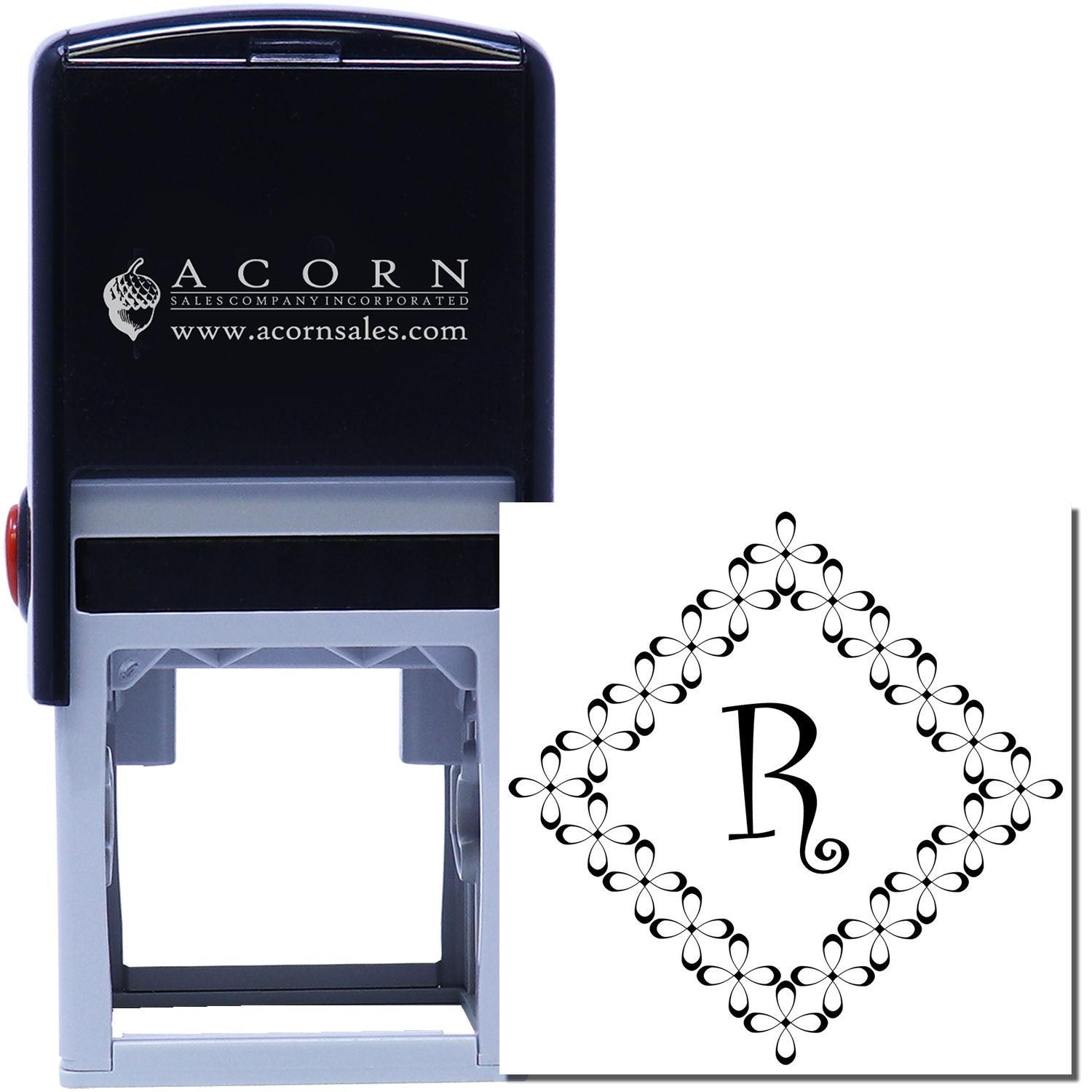 Custom self-inking rubber stamp with monogram R and decorative diamond border for personalized stationery and branding.
