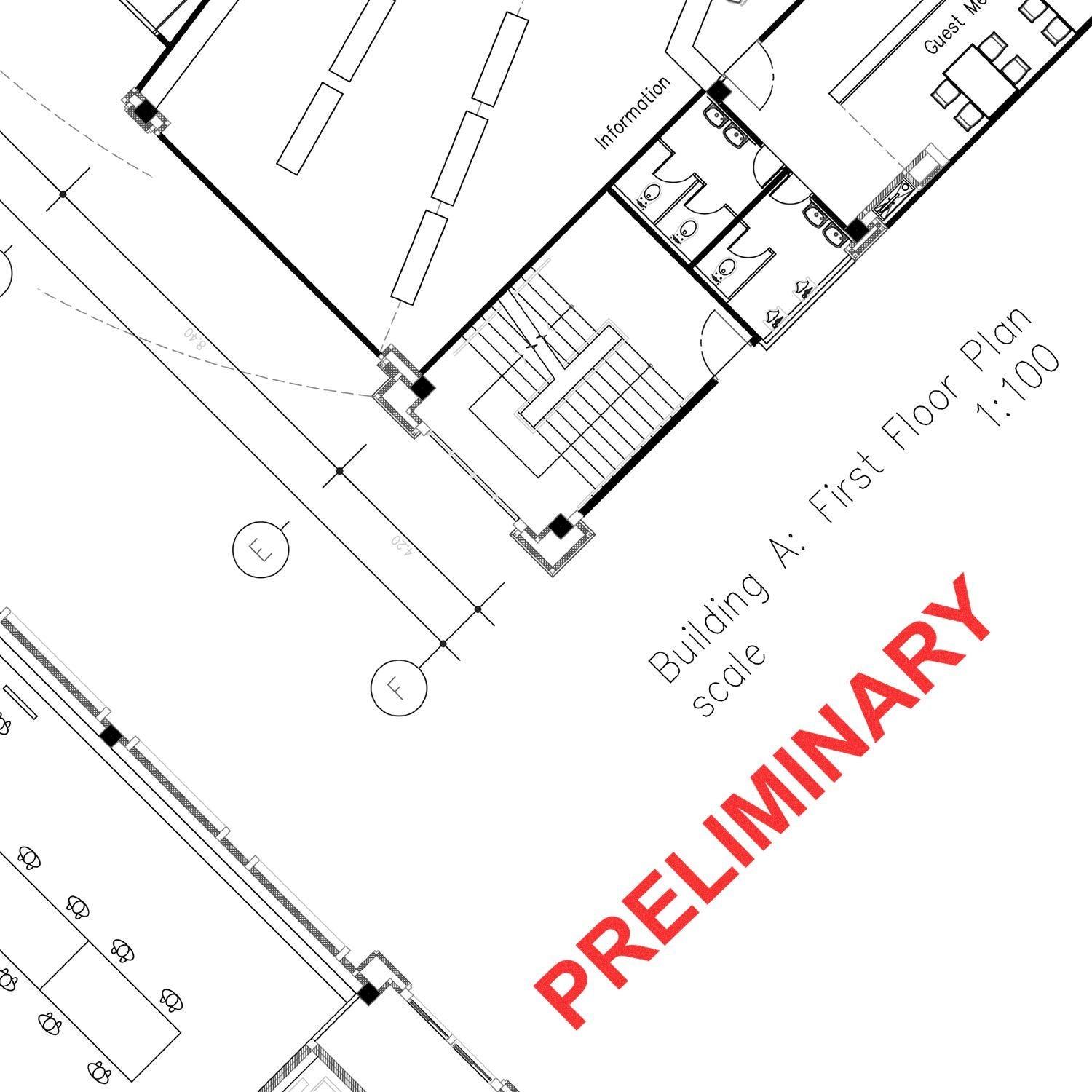 Architectural floor plan blueprint of a building first floor plan, marked preliminary design layout with rooms, stairs, and restrooms.