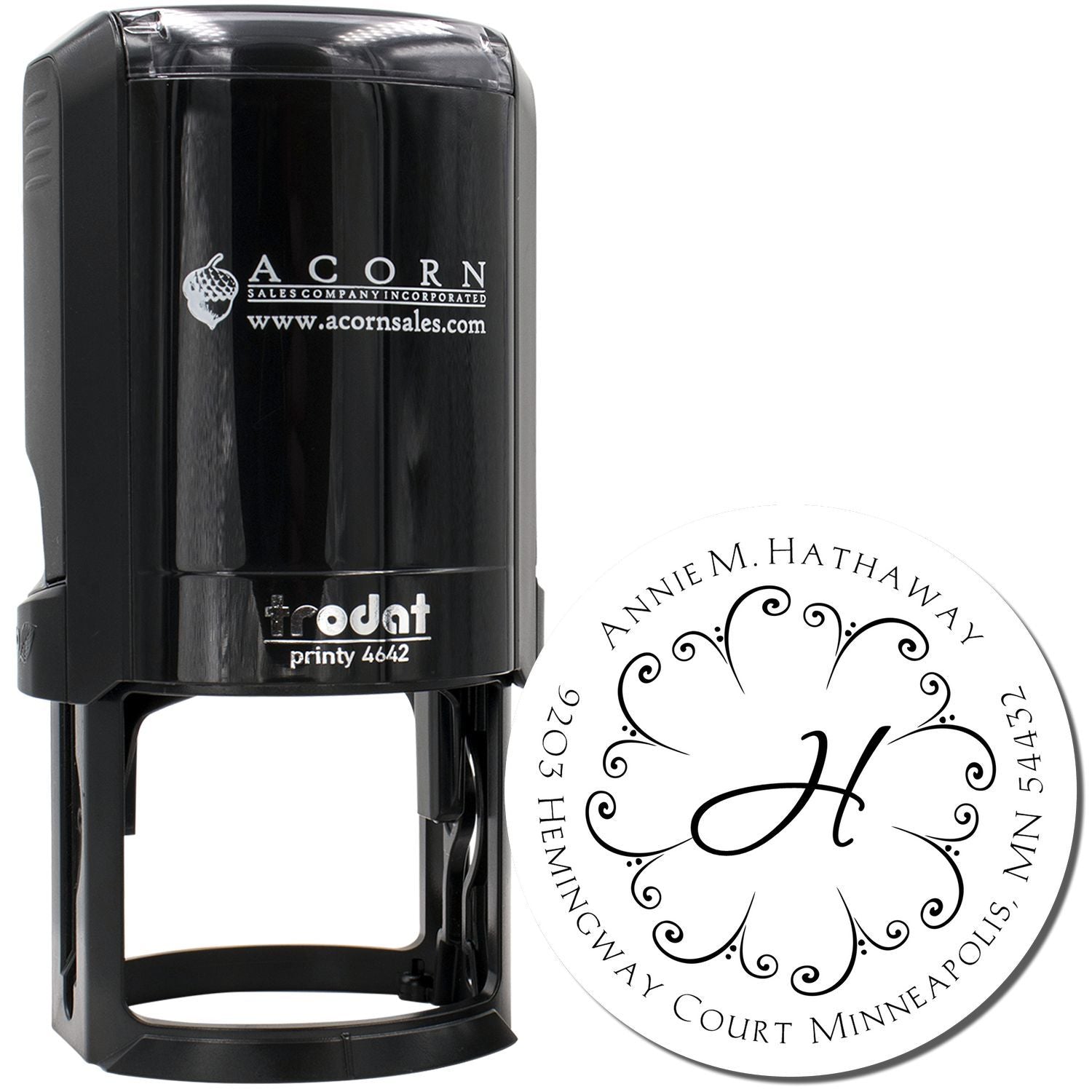 Custom self-inking rubber stamp with round monogram address design for personalized return addresses and mailings.