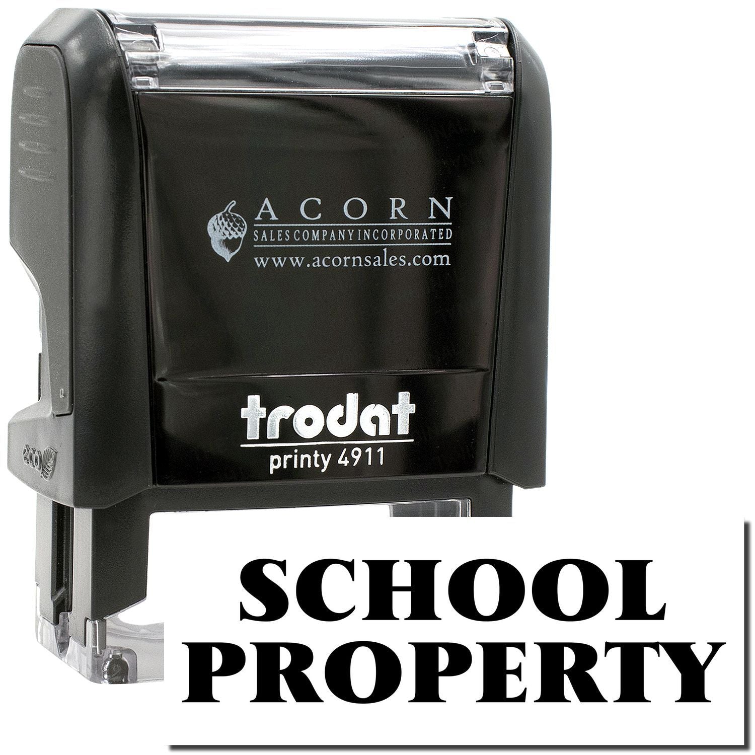 School property self-inking stamp, Trodat Printy 4911 with Acorn Sales branding.