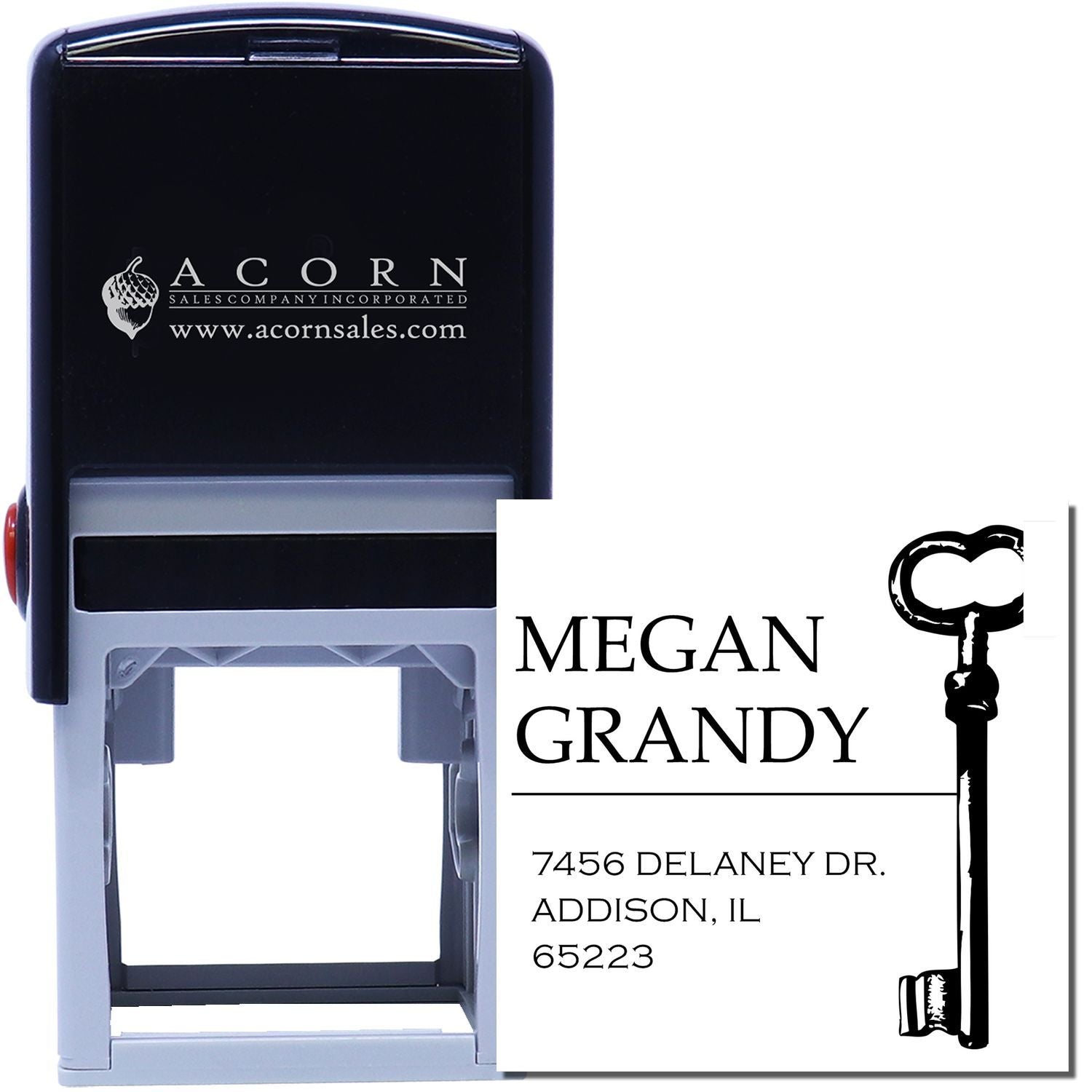 Custom self-inking rubber address stamp with key monogram design for Megan Grandy, Addison, IL return address.