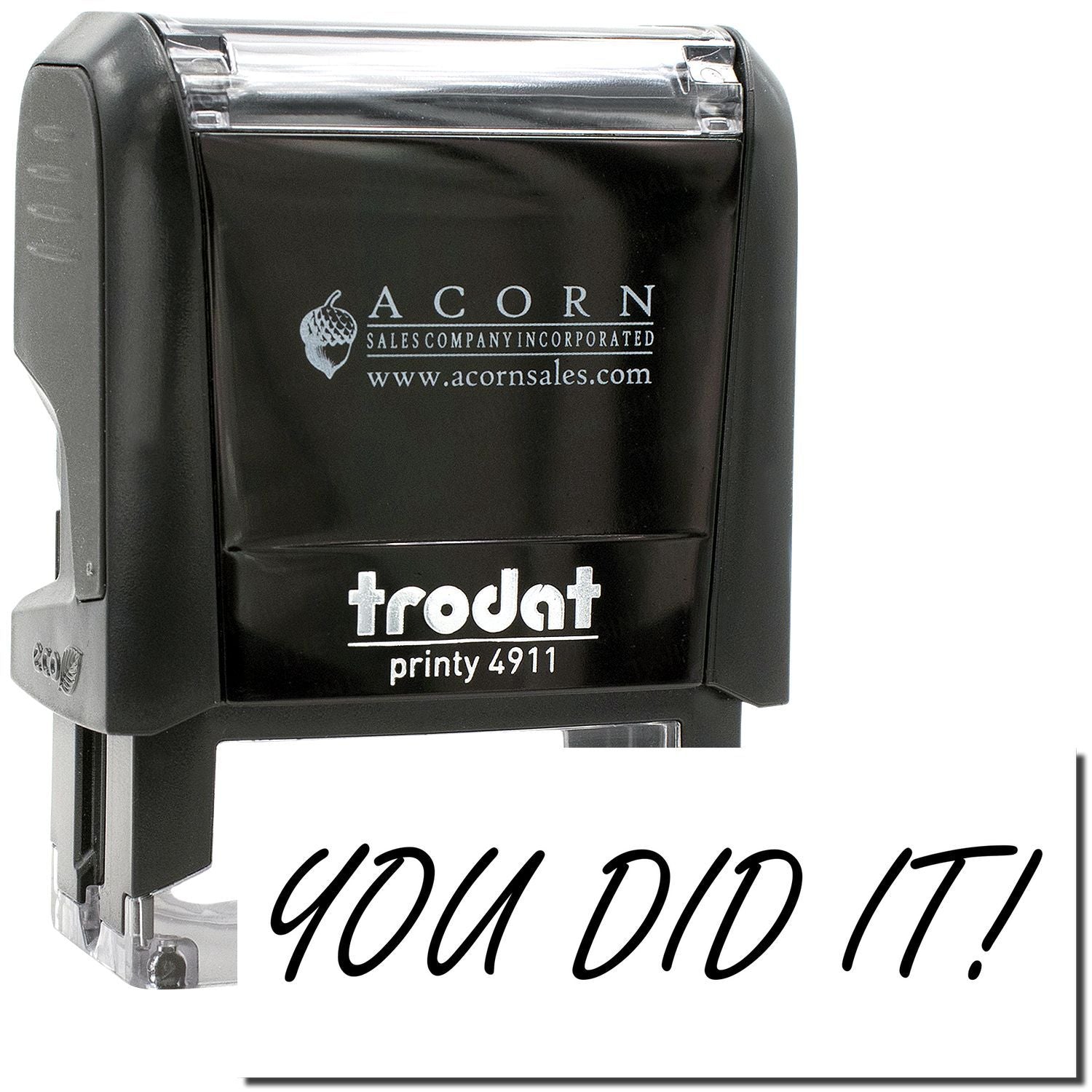 Black Trodat Printy 4911 self-inking custom stamp with You Did It! text and Acorn Sales Company logo.
