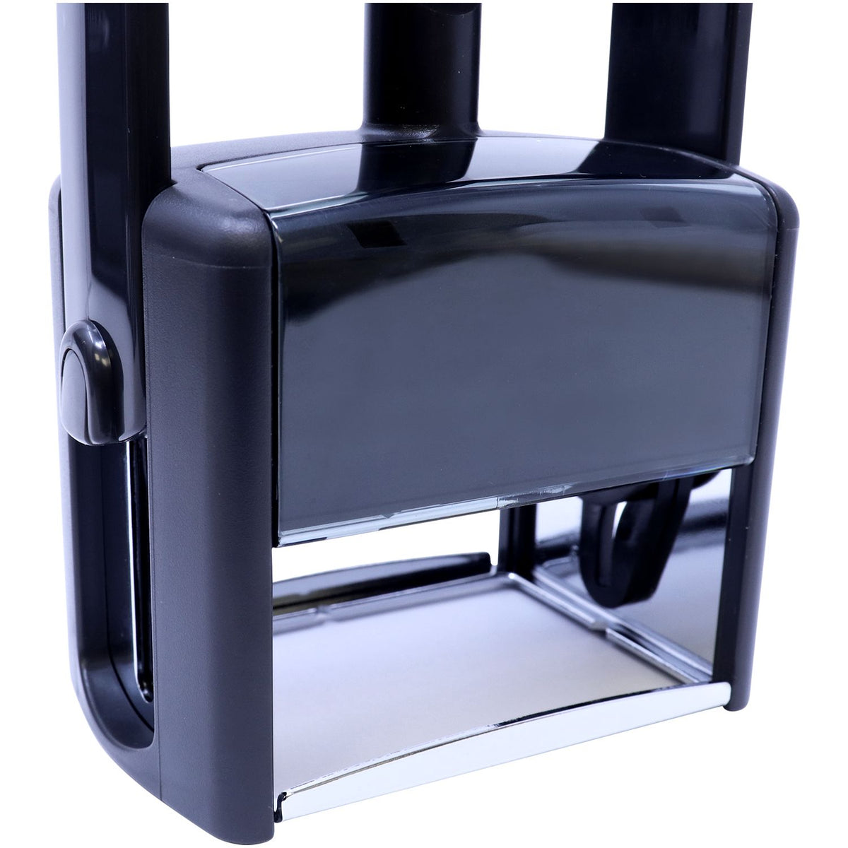 Close-up of hard-shell travel luggage with telescoping handle and corner edge, showcasing durable suitcase design for trips.