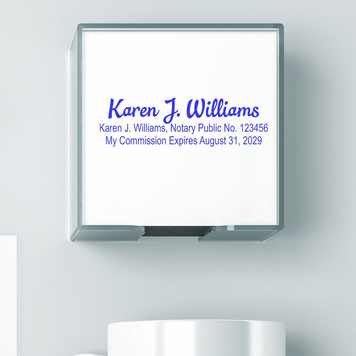 Custom acrylic notary public sign for Karen J. Williams with commission number and expiration date displayed.