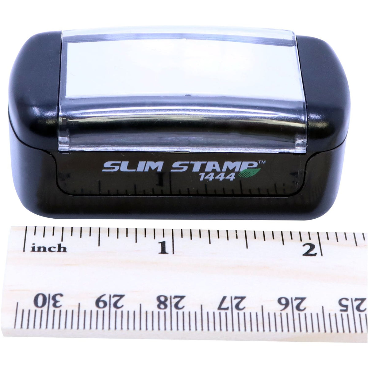 Slim Stamp 1444 self-inking stamp shown with inch ruler, for quick size and measurement reference.