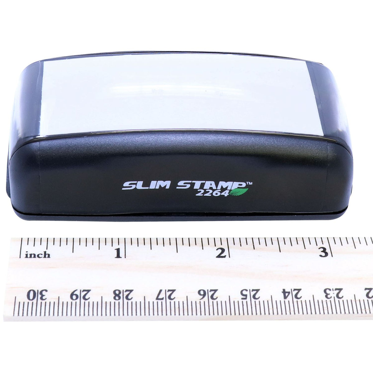 Product Slim Stamp 2264 ink stamp front view with size ruler, showing compact dimensions for accurate measuring and branding tool.