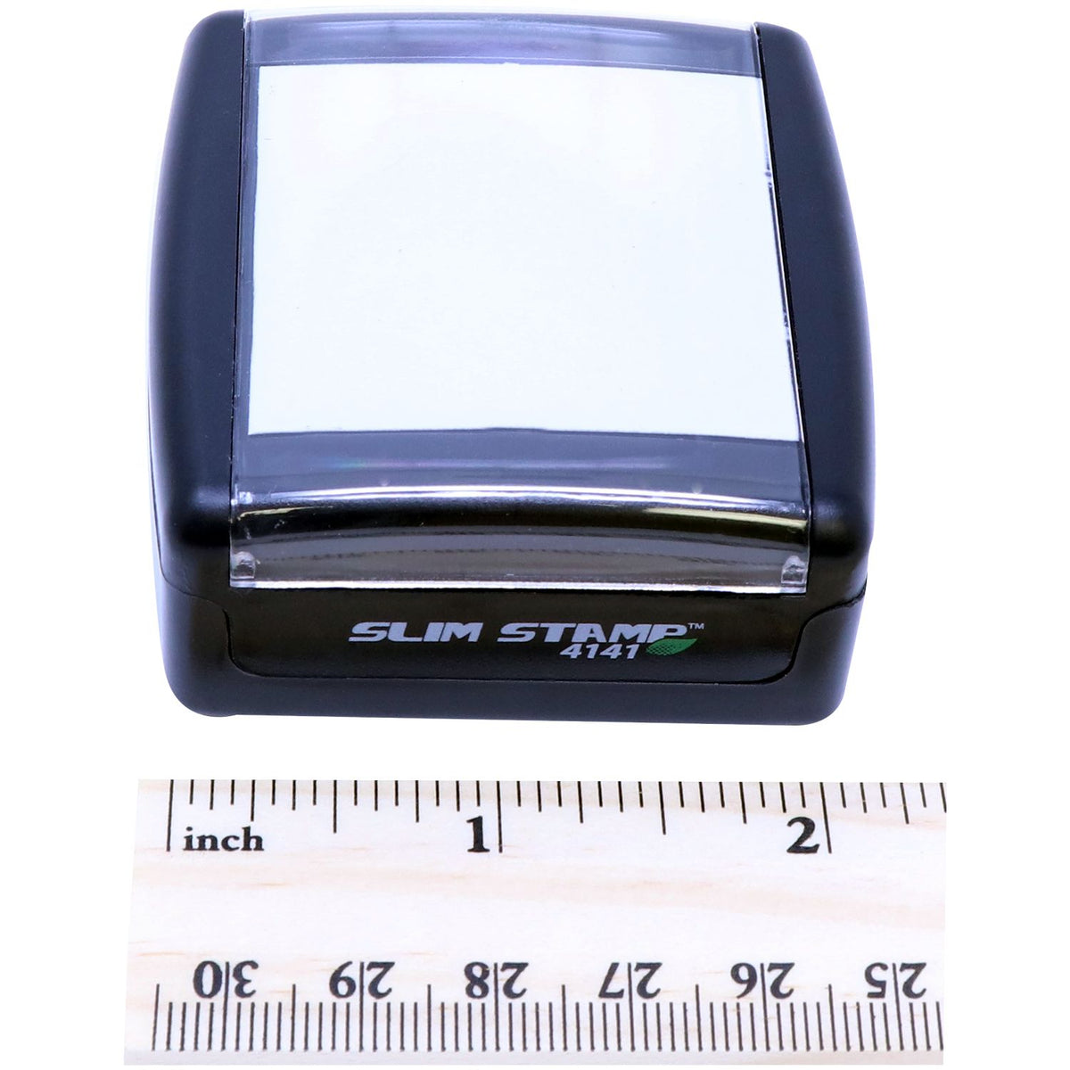 Slim Stamp 4141 compact stamp shown with inch ruler for size measurement and product identification.