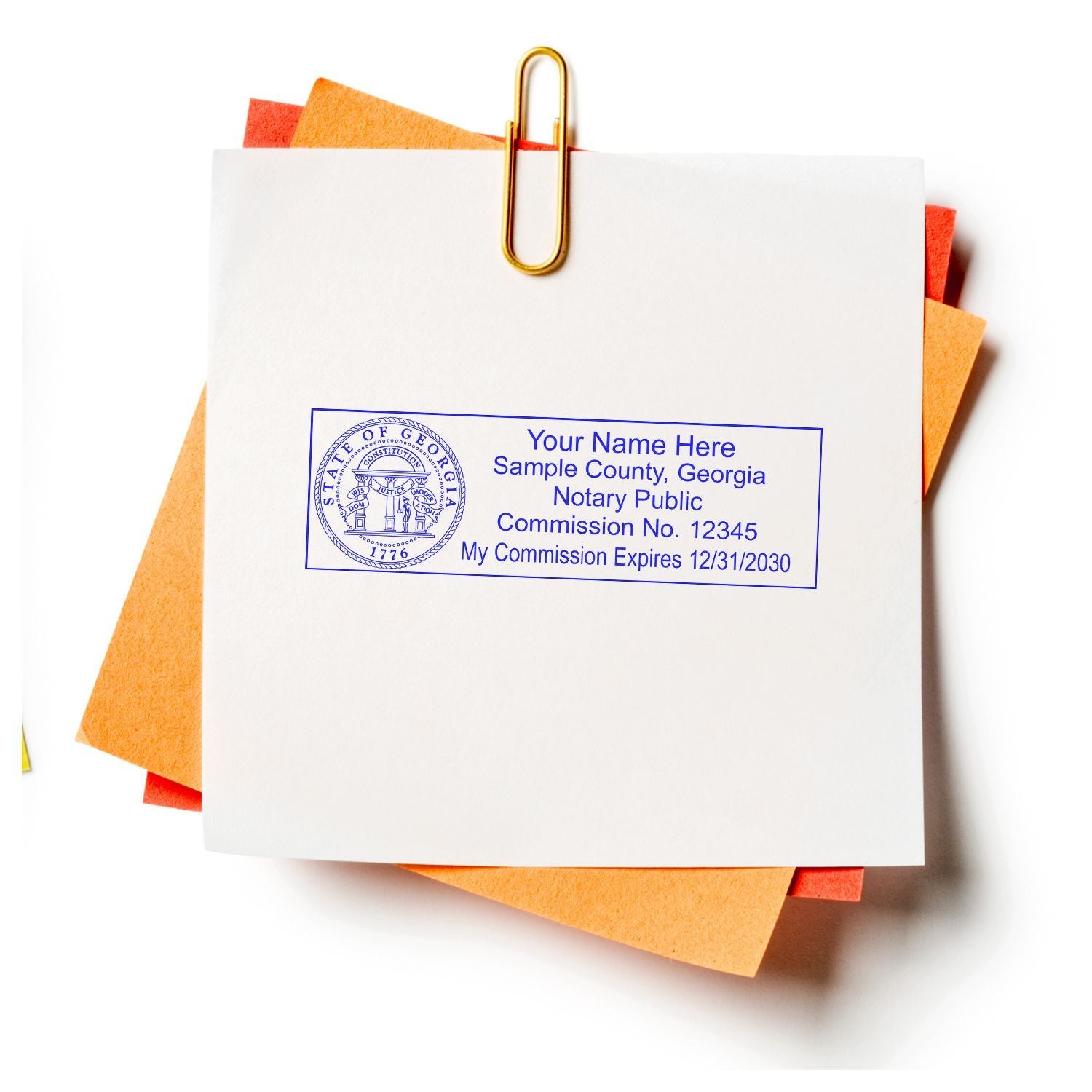Georgia notary public seal on document with paperclip and colorful sticky notes, business paperwork close-up.
