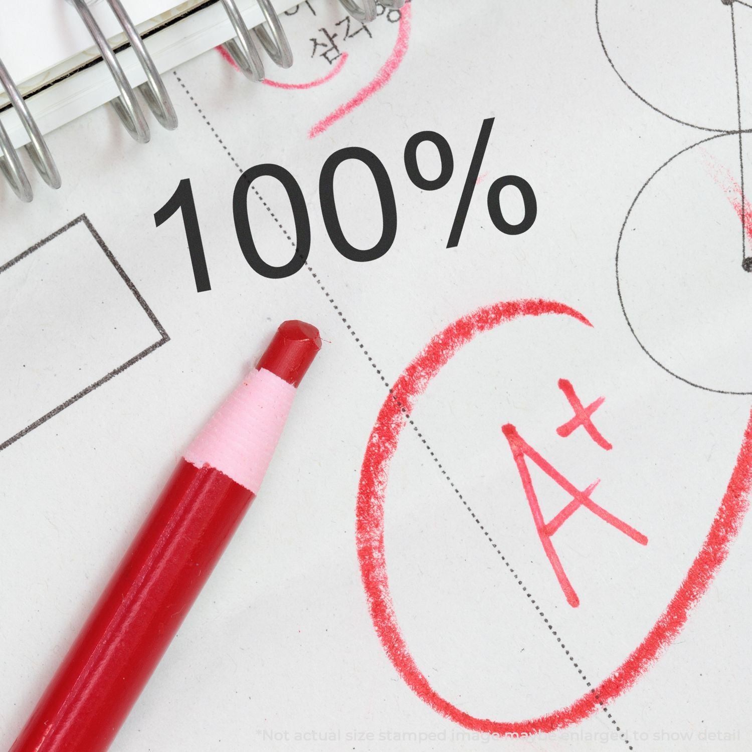 Close-up of math worksheet showing 100% score, red marker pen, and diagram lines for measuring success and completion rate.