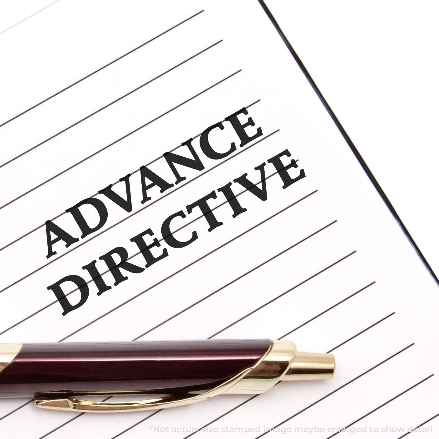 Advance directive form with pen on lined paper, healthcare legal planning document concept