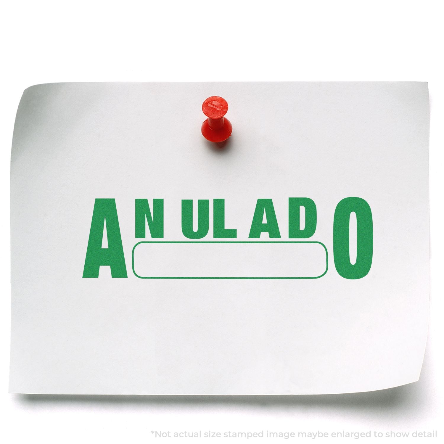 Red-topped pushpin highlights ANULADO stamp on a white document, indicating canceled or voided status.