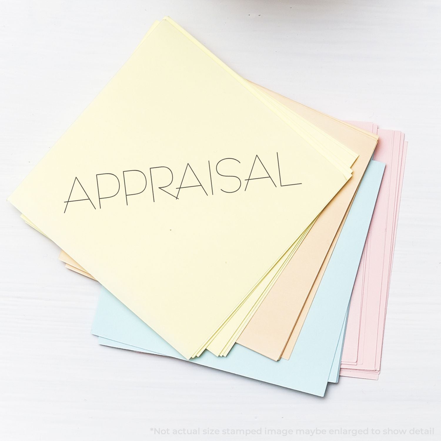 Appraisal document folder with APPRAISAL label on pastel stationery, ideal for property valuation and assessment services paperwork.
