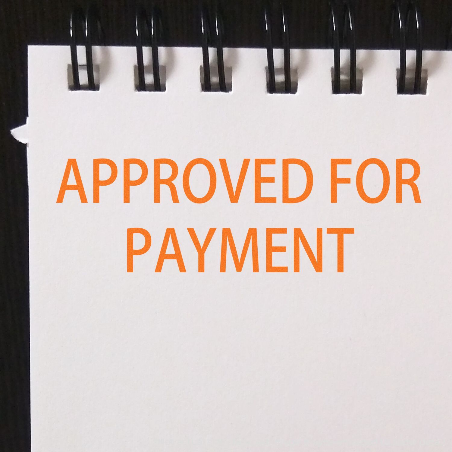 Approved for Payment stamp on a financial document, indicating official authorization to process invoice or check payments securely