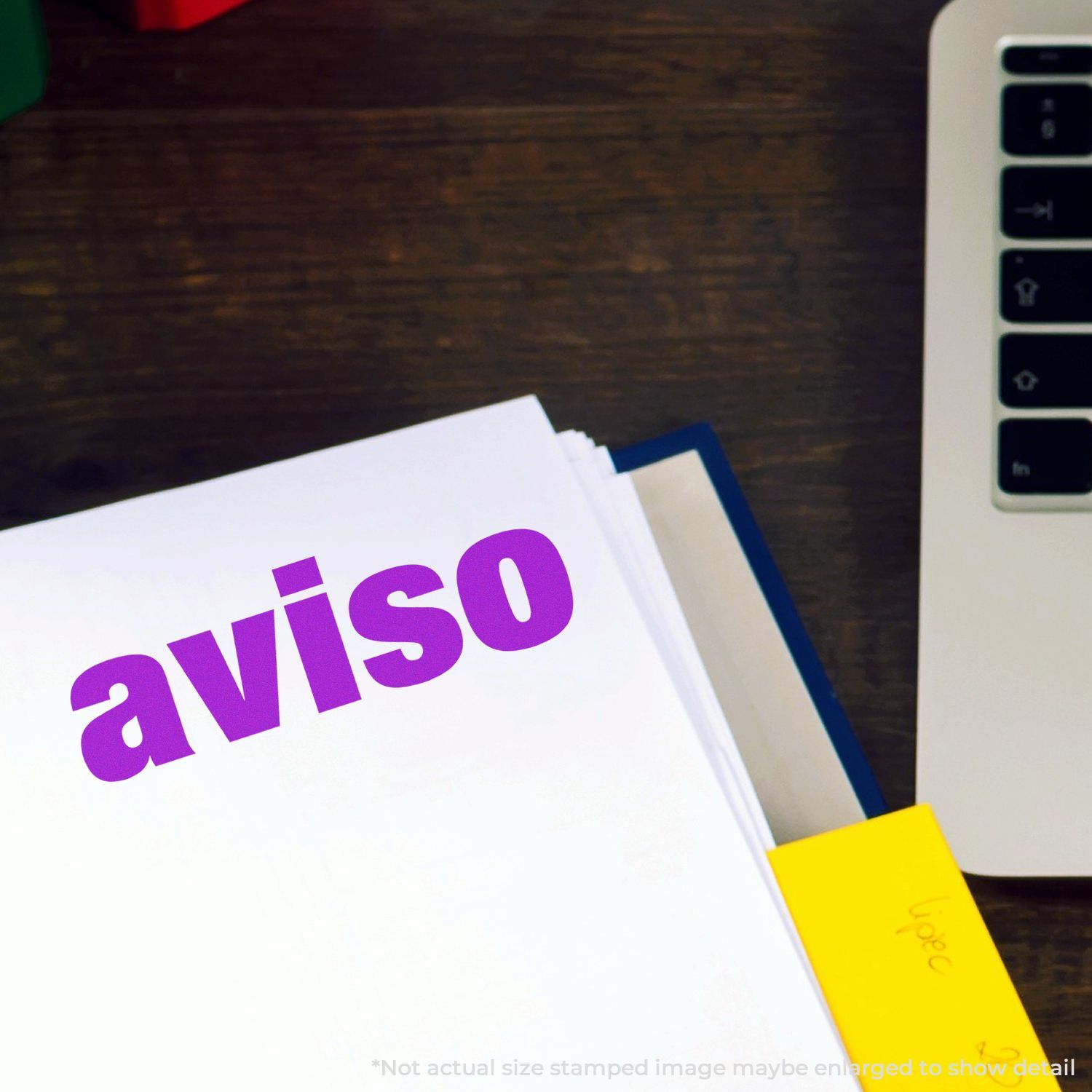 Business documents with aviso text on a desk beside a laptop, office paperwork and notice concept