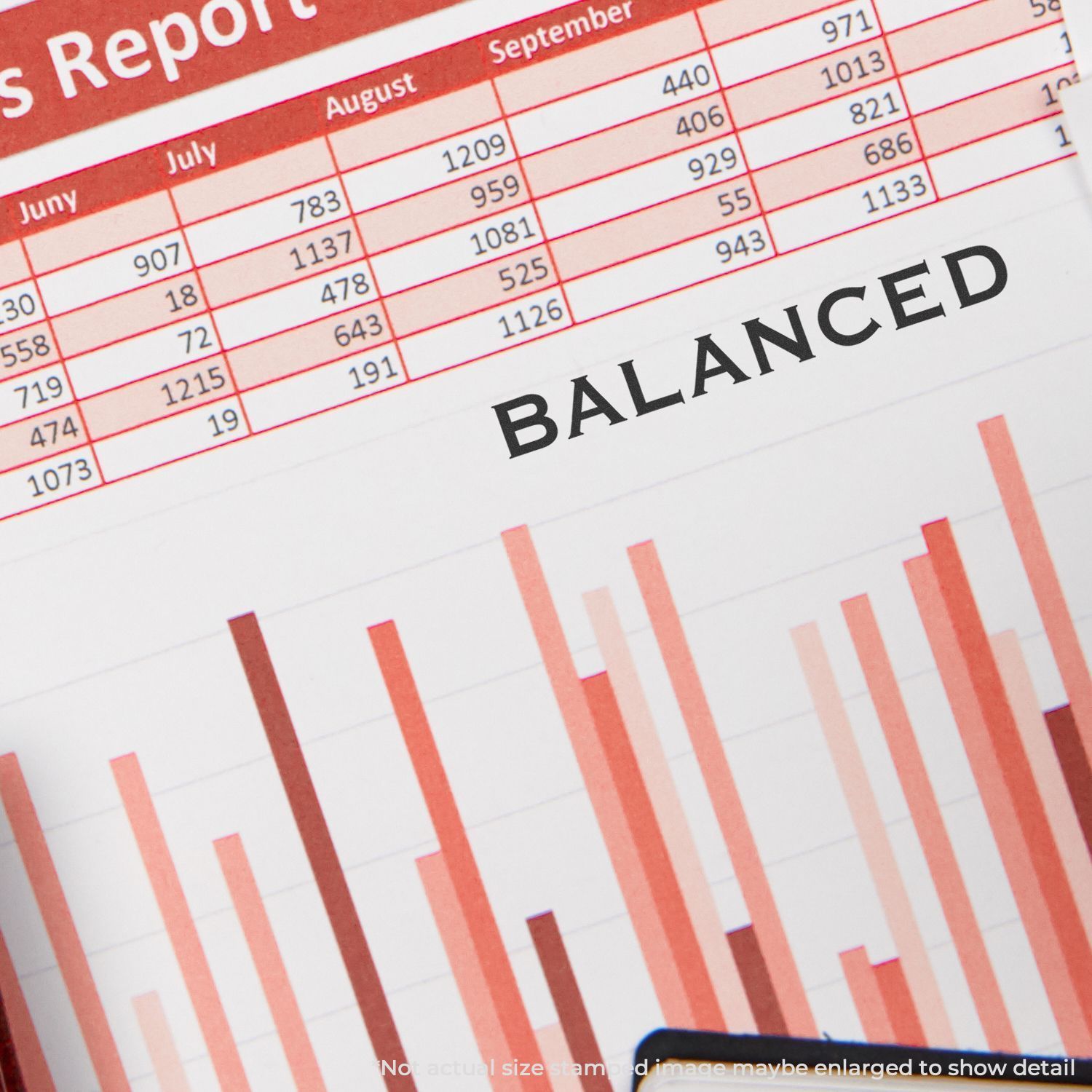 Balanced financial report with bar chart and monthly business data analysis.