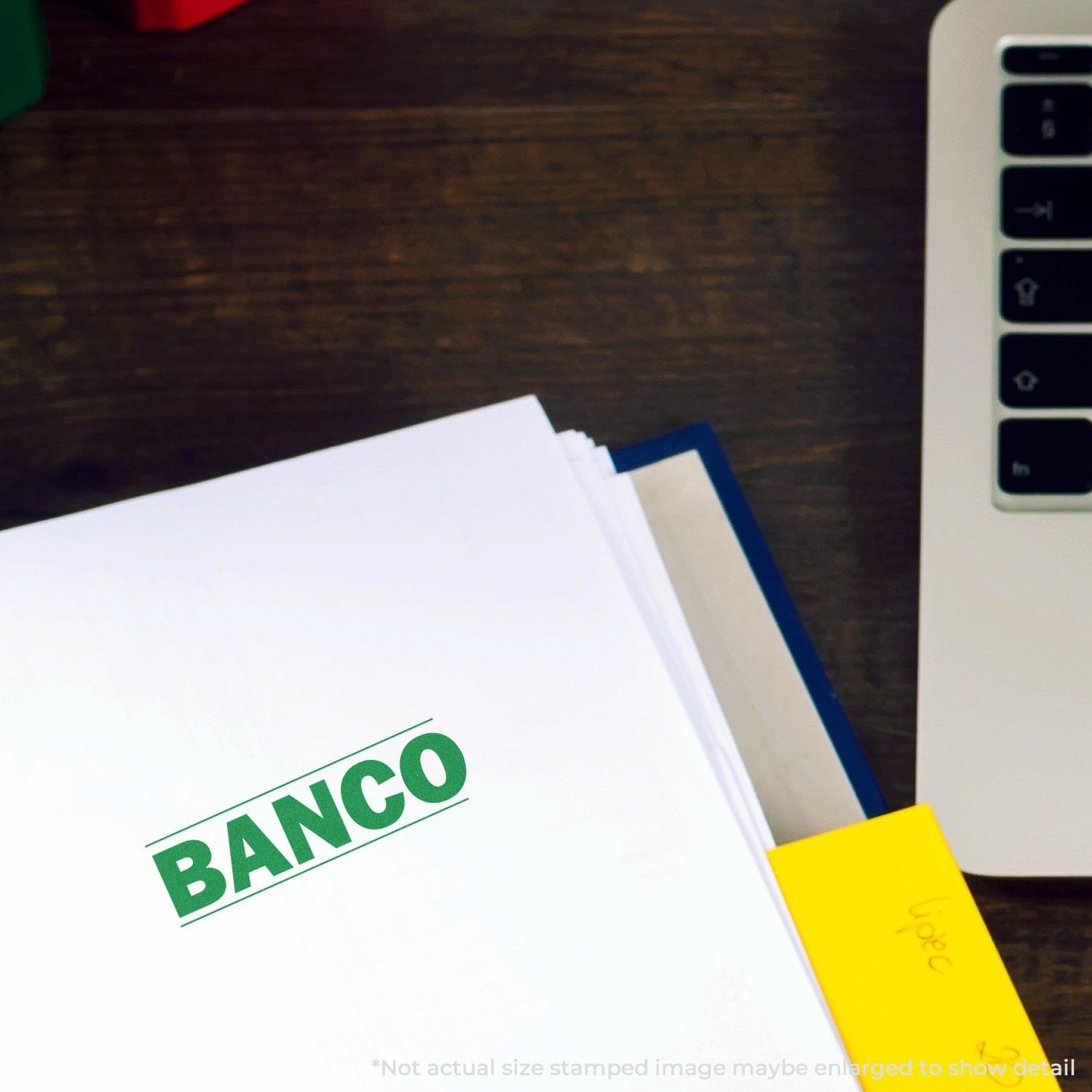 Banco banking materials with credit cards and smartphone on desk, highlighting financial services and mobile payments.
