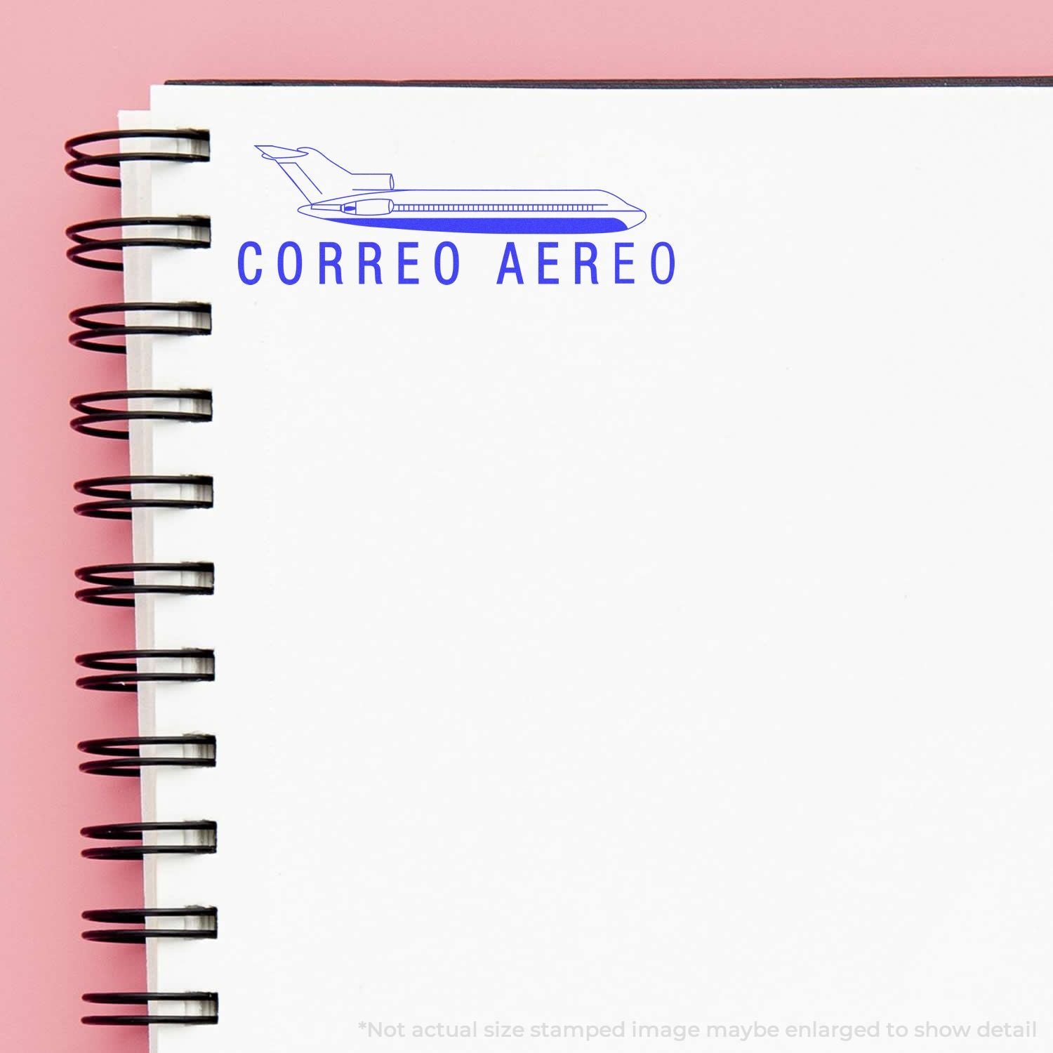 Cuaderno con icono de avin y texto CORREO AREO, imagen promocional del servicio de correo areo
