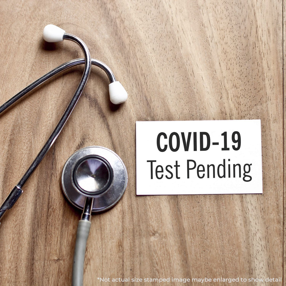 Stethoscope beside sign reading COVID-19 Test Pending, indicating coronavirus screening and awaiting test results.
