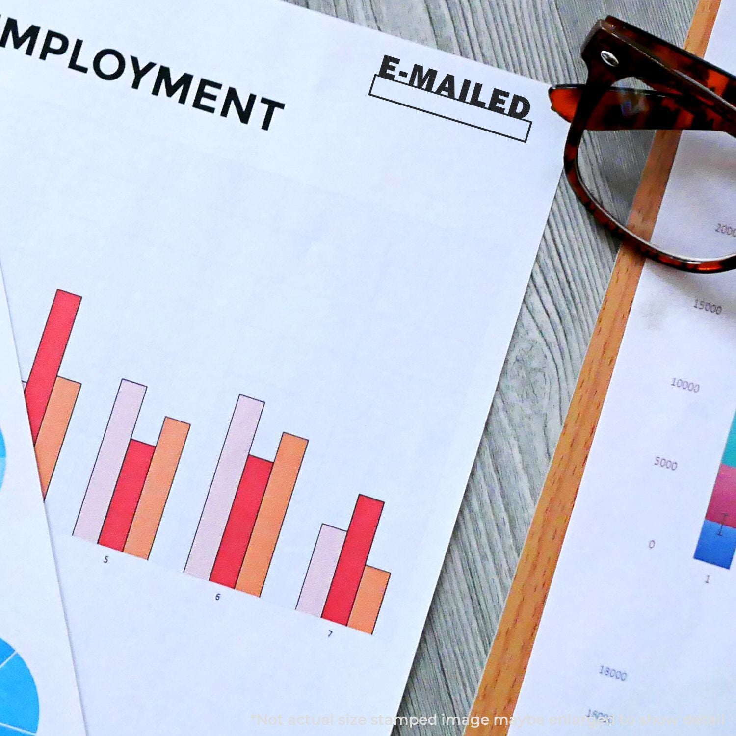 Employment e-mailed analytics report with colorful bar charts beside a magnifying glass, showing email performance data for hiring.