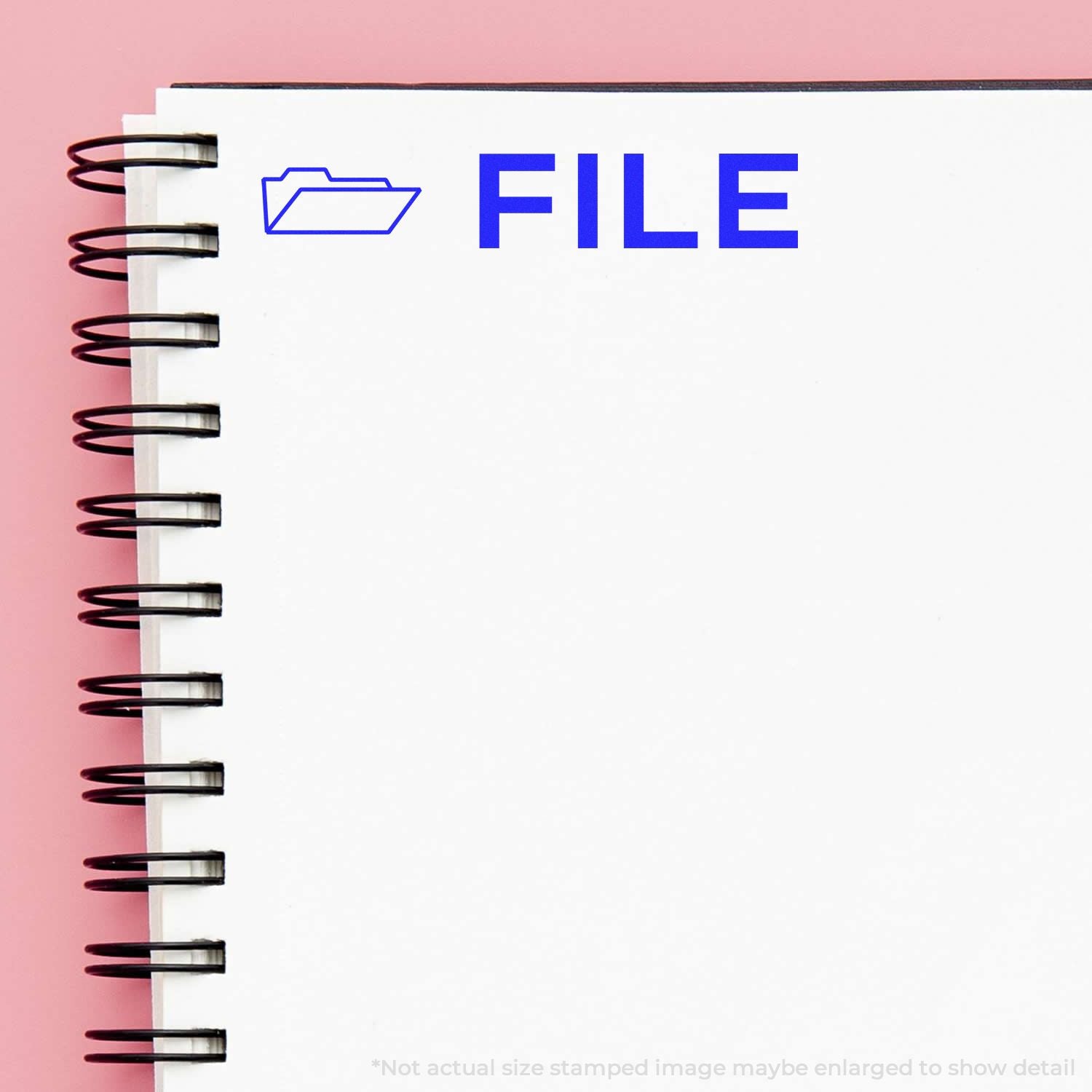 FYLE logo on spiral notebook with folder icon, representing file management and organizing tools on a pink background for business.
