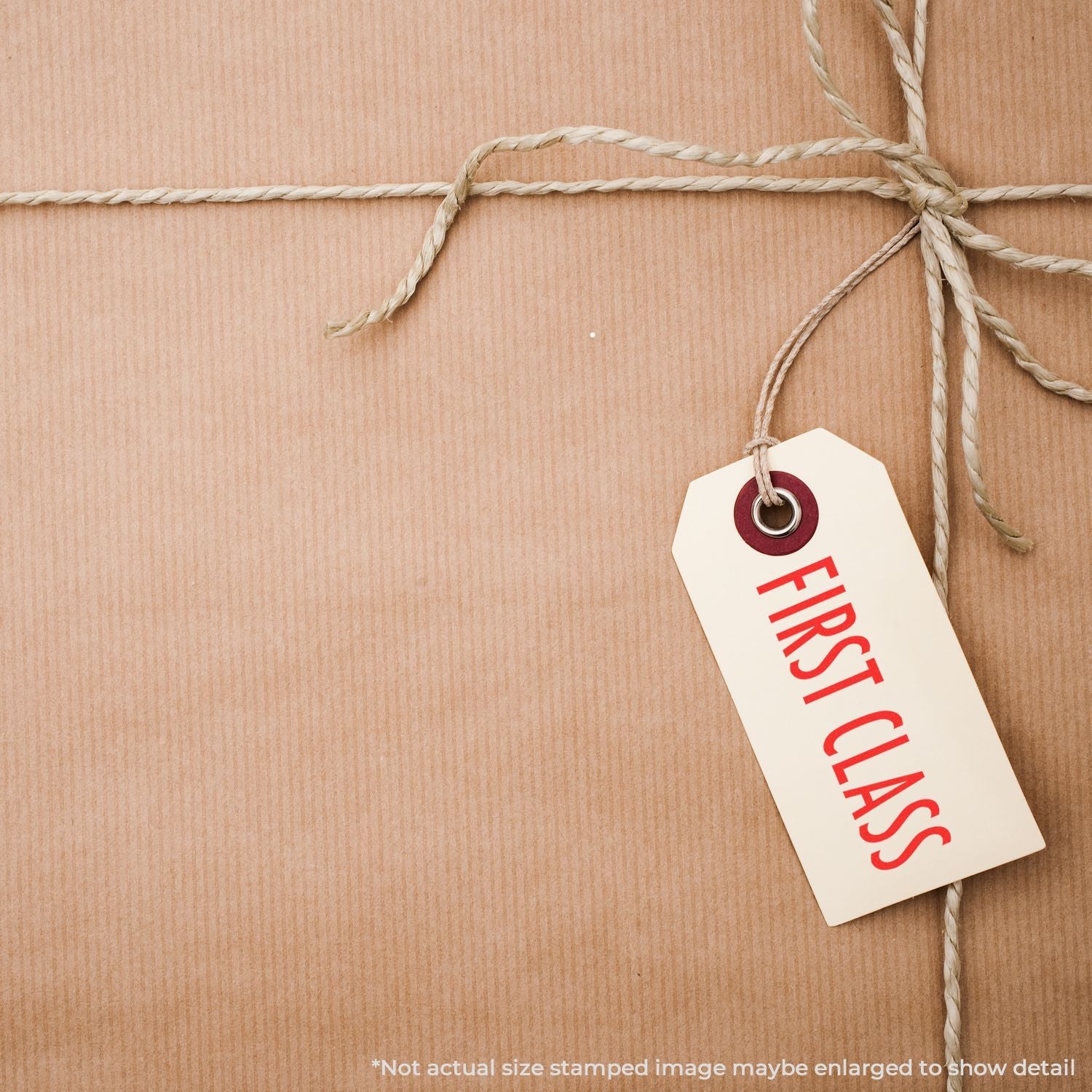 Sustainability-themed product tag reading EARTH tied with twine on wooden surface for eco branding and packaging.