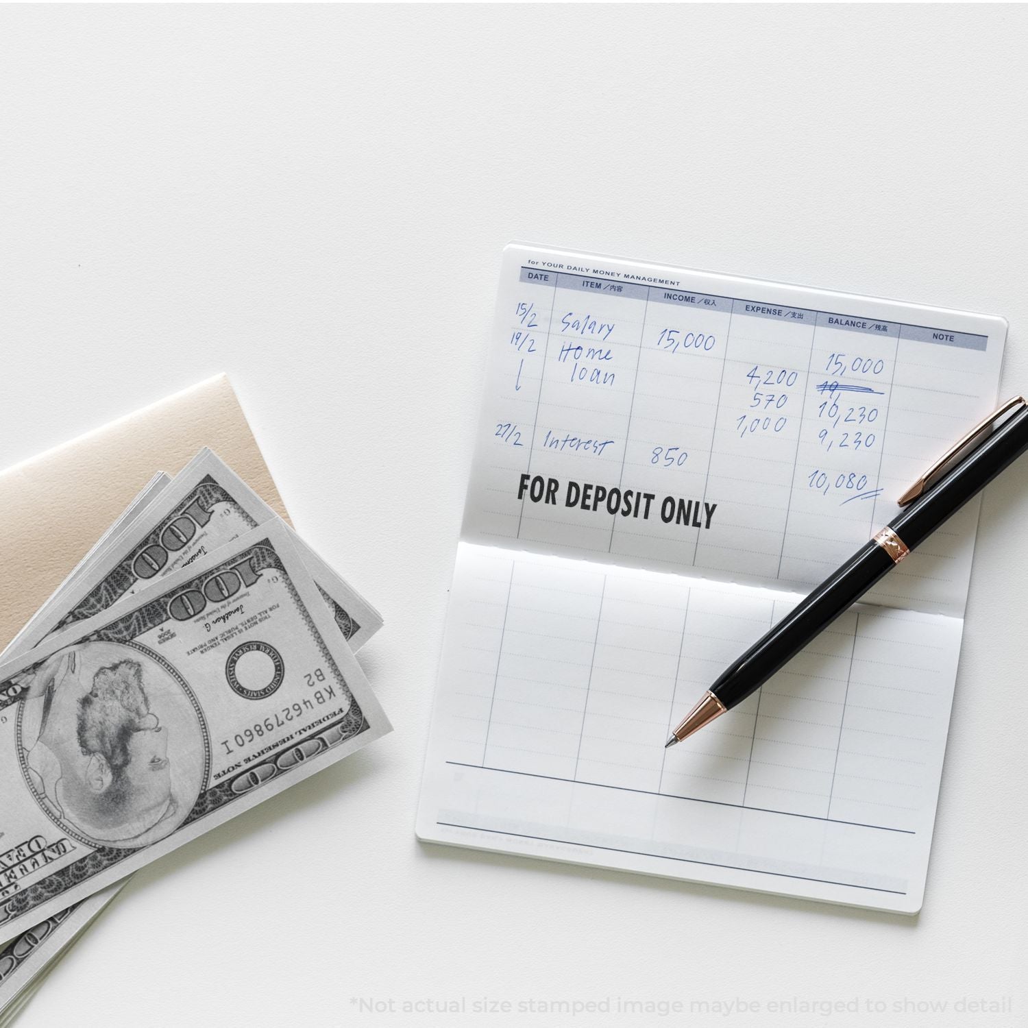 Money management budget sheet with deposit slip and US dollar cash, showing income, expenses, and balance tracking.
