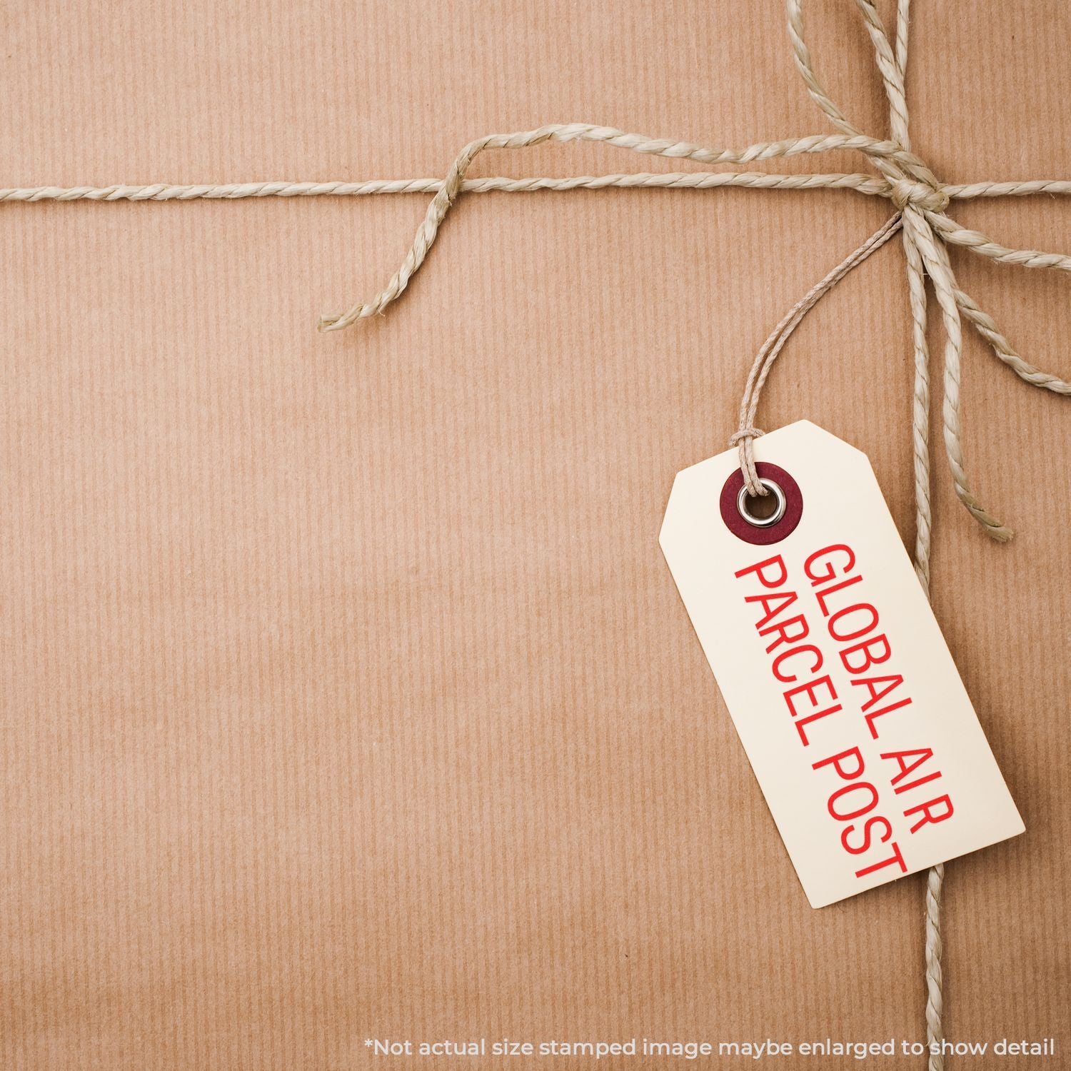 Global brand parcel stamp tag on twine tied cardboard packageideal for shipping, branding, and logistics SEO.