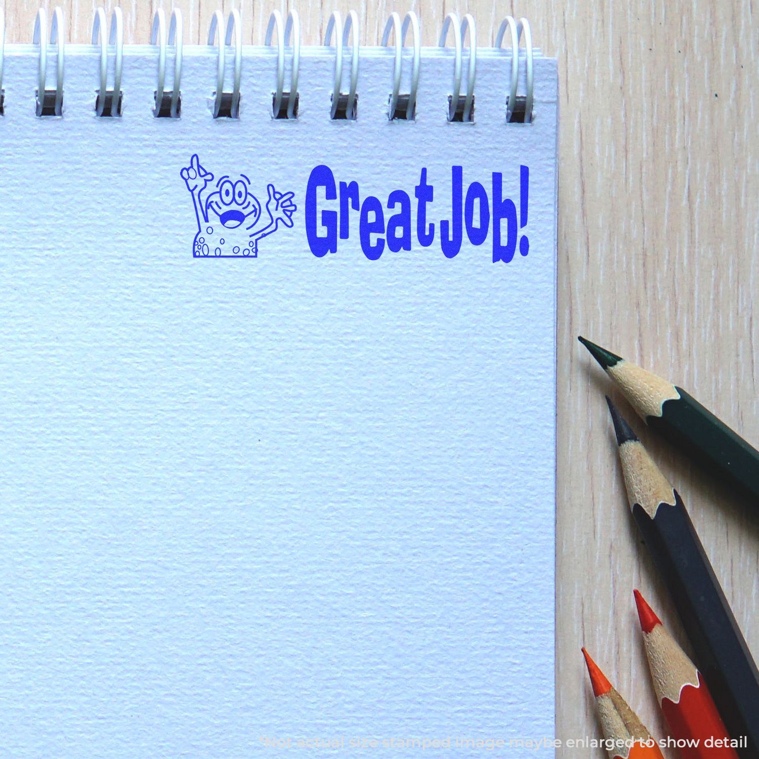 Back-to-school reward sign reading Great Job! with colored pencils, celebrating student achievement in a classroom